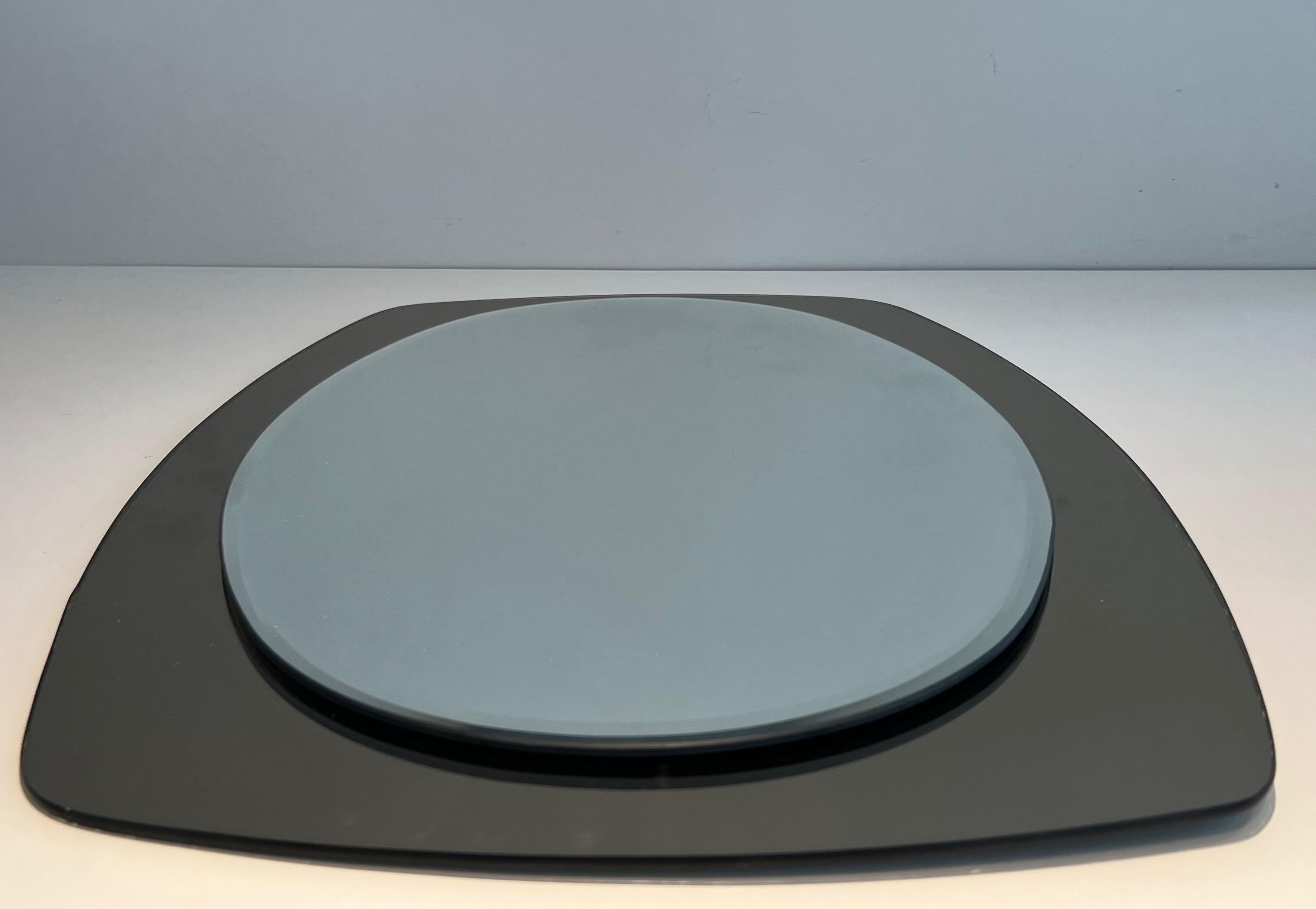 Oval mirror. Italian work by Fontana Arte. Circa 1970 For Sale 1