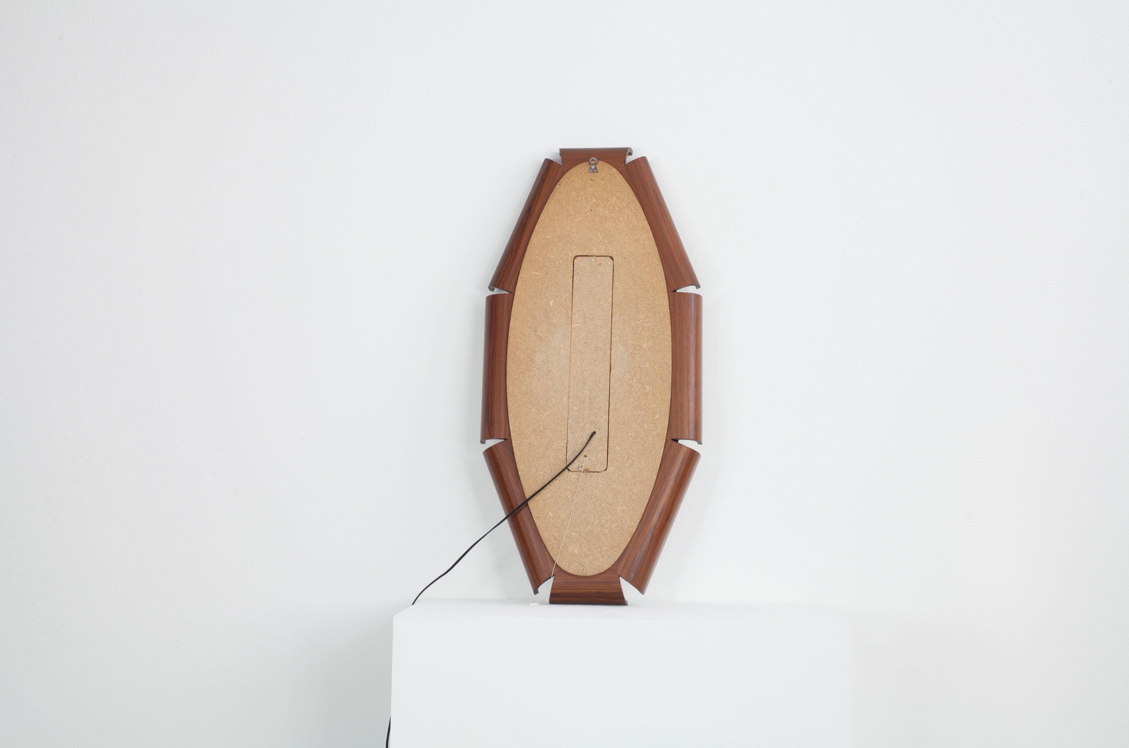 Mid-Century Modern Oval Mirror with Backlight on Curved Teak Plywood Frame, by I.S.A. Bergamo For Sale
