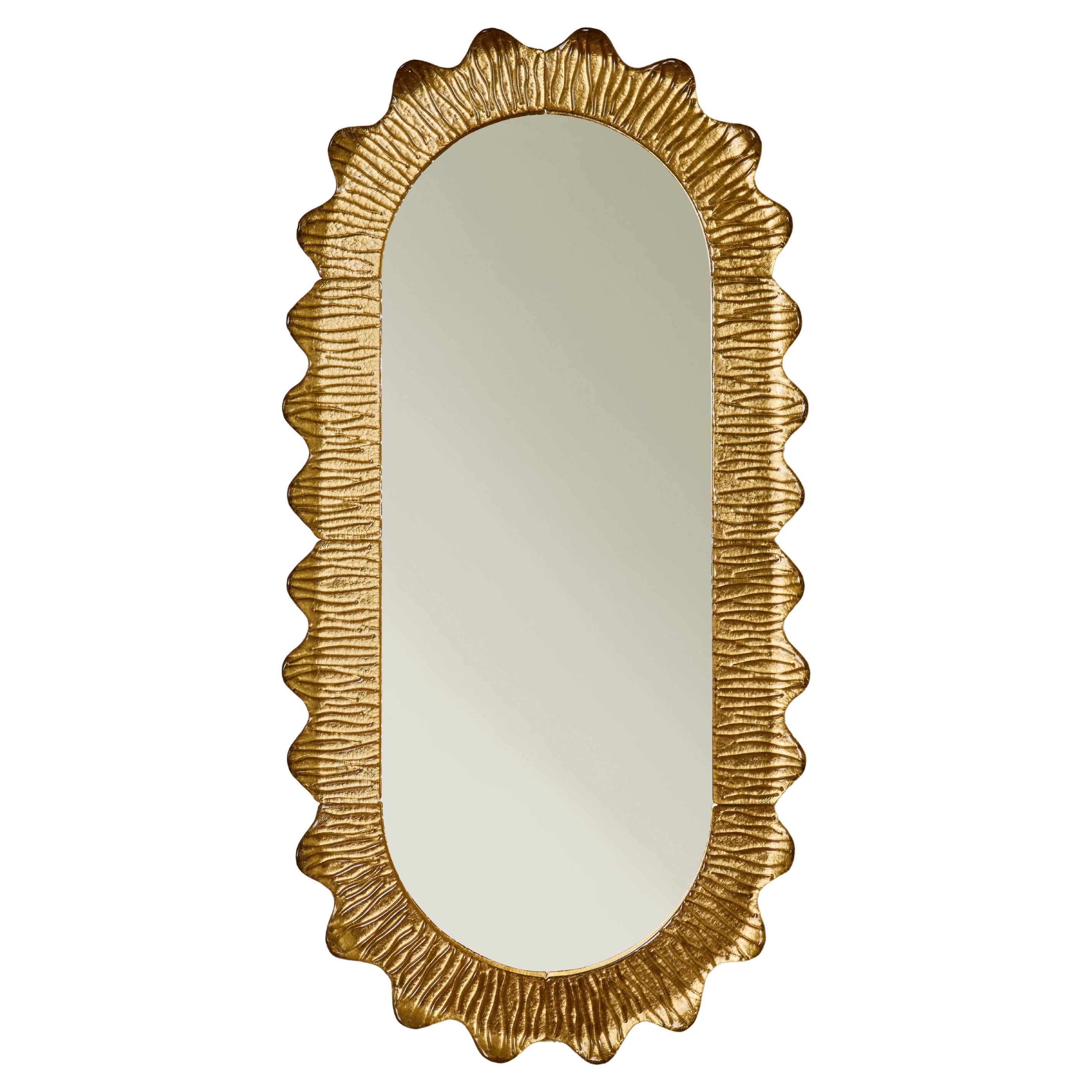 Oval mirror with frame in gilt Murano glass by Studio Glustin