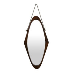 Oval mirror with wooden frame and leather cord details, 1950s