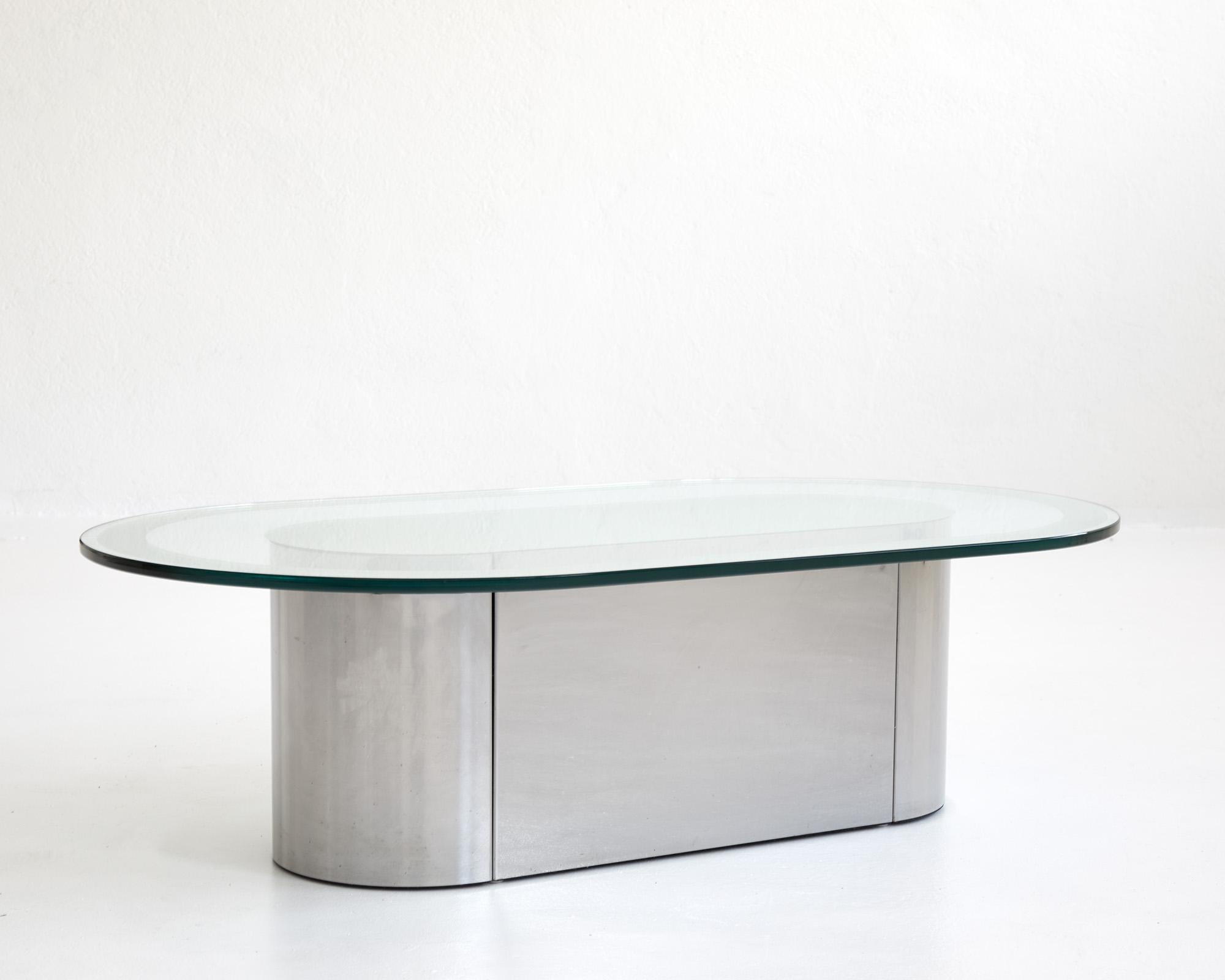 Space Age Oval mirrored polished metal and glass coffee table, Italy 1970's For Sale