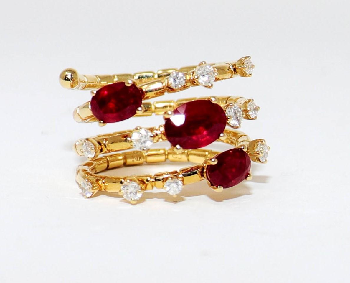 Ring size: 7

We absolutely love this contemporary multi-row cocktail ring filled with rubies and diamonds. Featuring 3 rows of stunning gemstones, this chic, flexible ring offers both style and comfort, making it an absolute winner in our