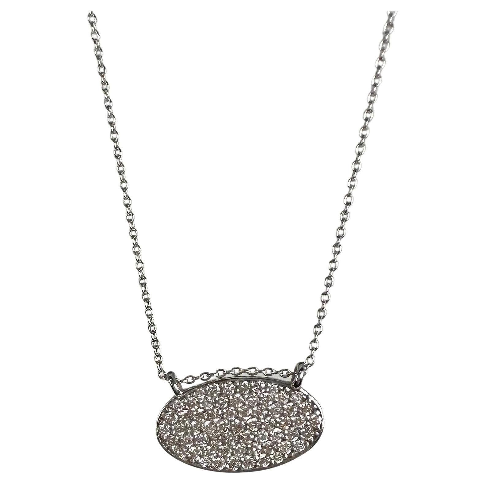 Oval modern pave set diamond pendant necklace 14KT 18"long  For Sale