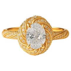 Anello di fidanzamento ovale con moissanite aureolata in oro 14k