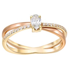 Oval moissanite spiral 14k gold ring