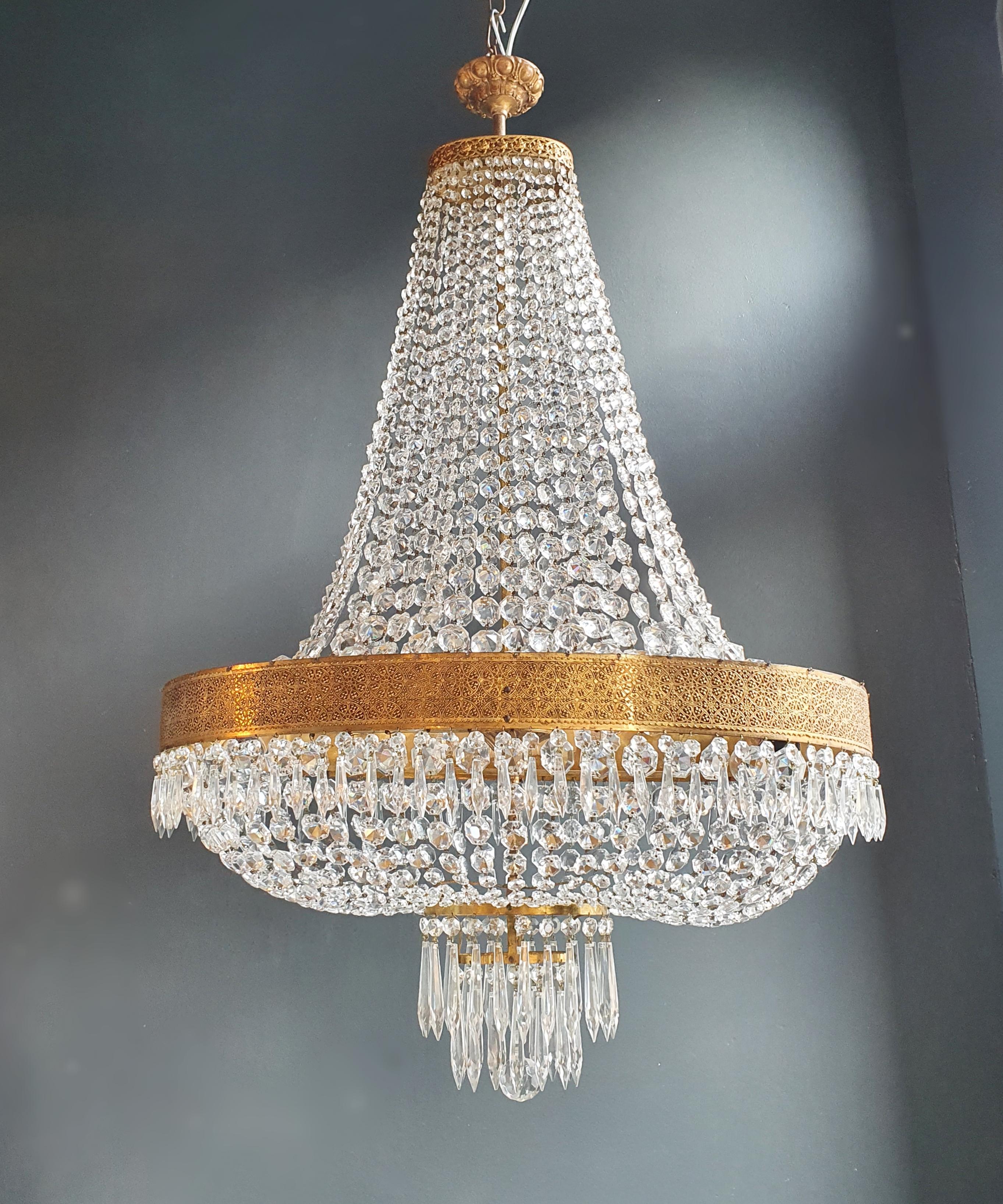 old chandelier with love and professionally restored in Berlin. electrical wiring works in the US.
Re-wired and ready to hang
not one missing
Cabling completely renewed. Crystal, hand-knotted.
Measures: Total height 140 cm, height without chain: 110