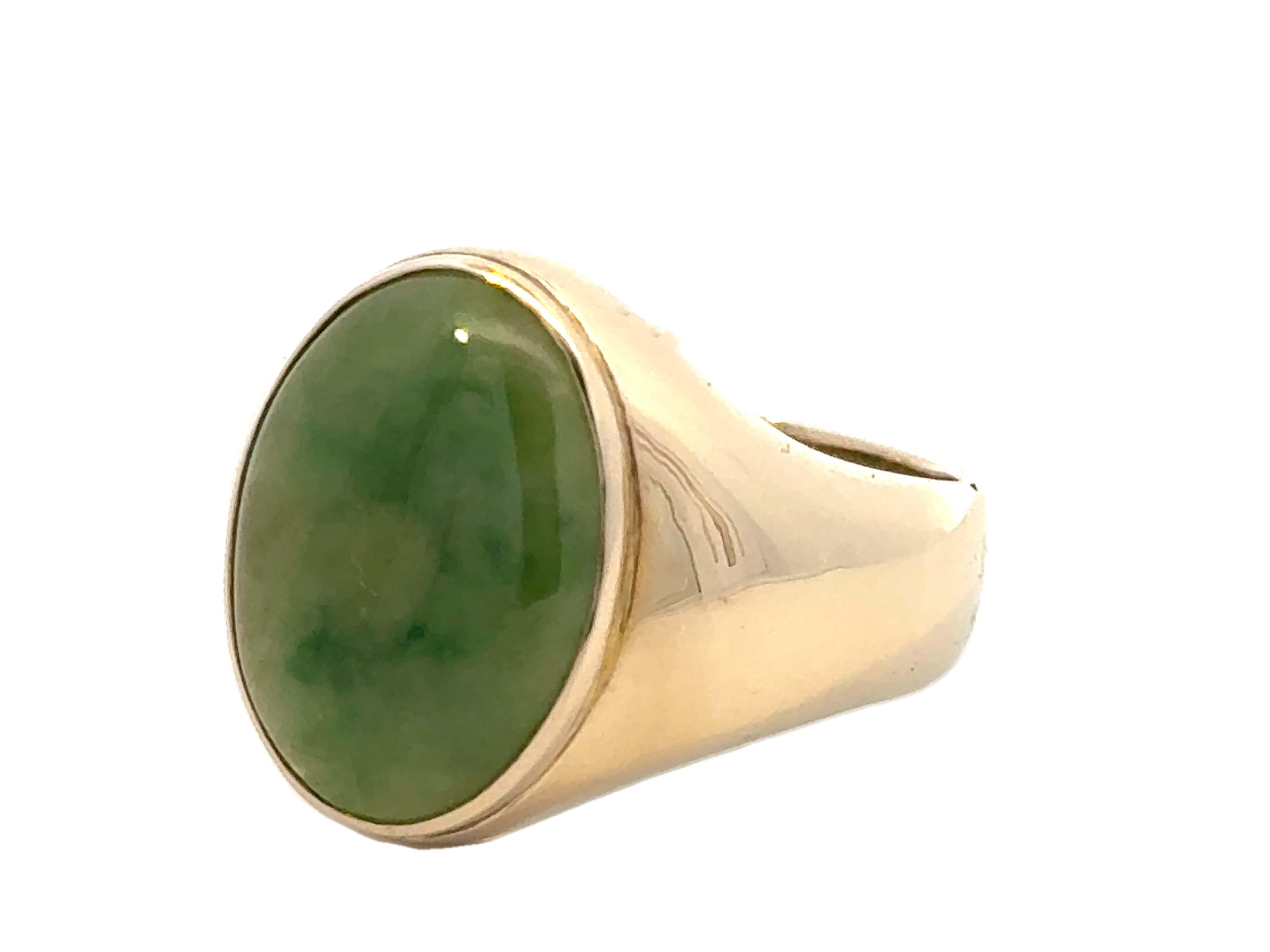 Oval Cut Oval Mottled Green Jade Ring 14K Yellow Gold For Sale
