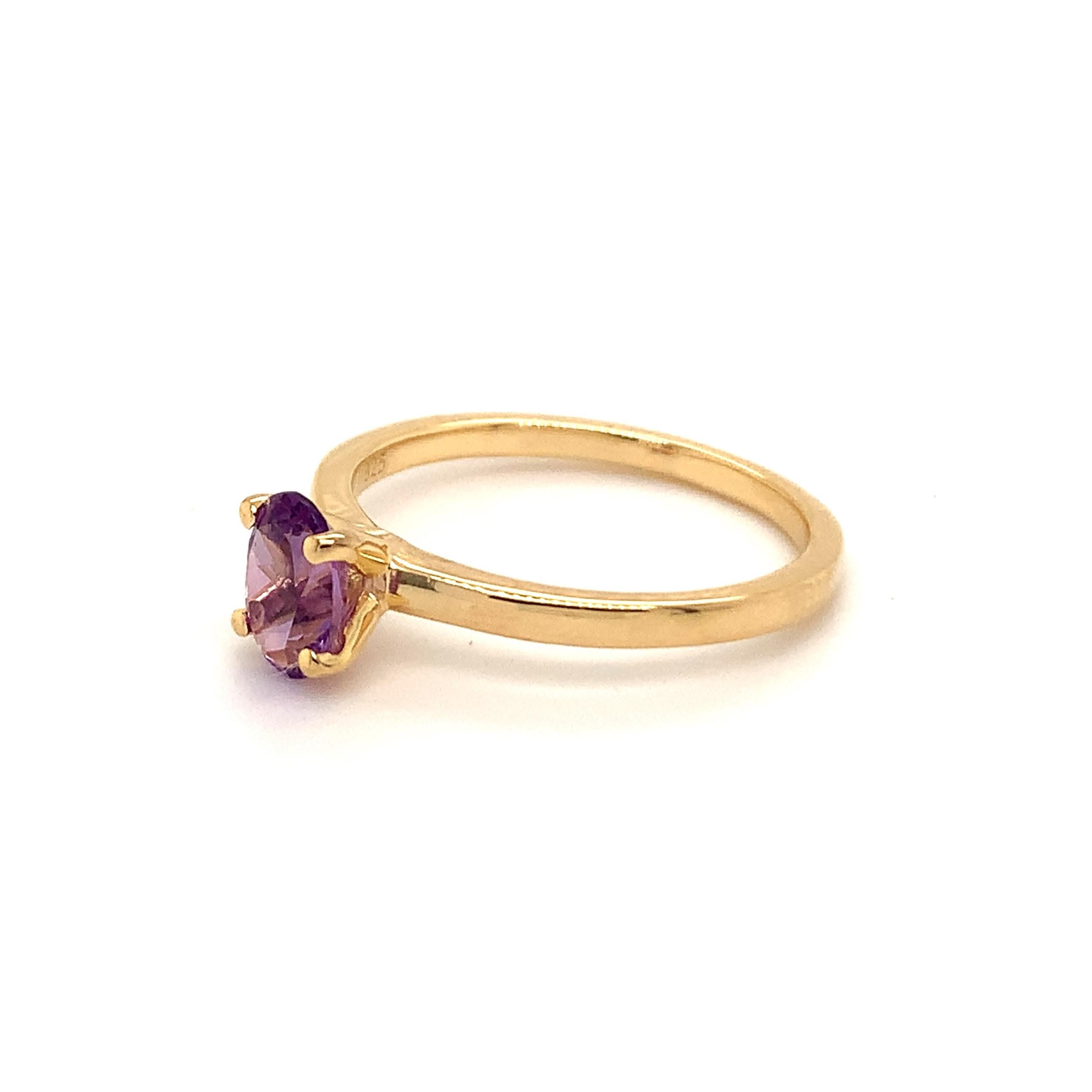 Oval Shape Amethyst Gemstone beautifully crafted in a Ring. A fiery Violet Color February Birthstone. For a special occasion like Engagement or Proposal or may be as a gift for a special person.

Primary Stone Size - 7x5mm