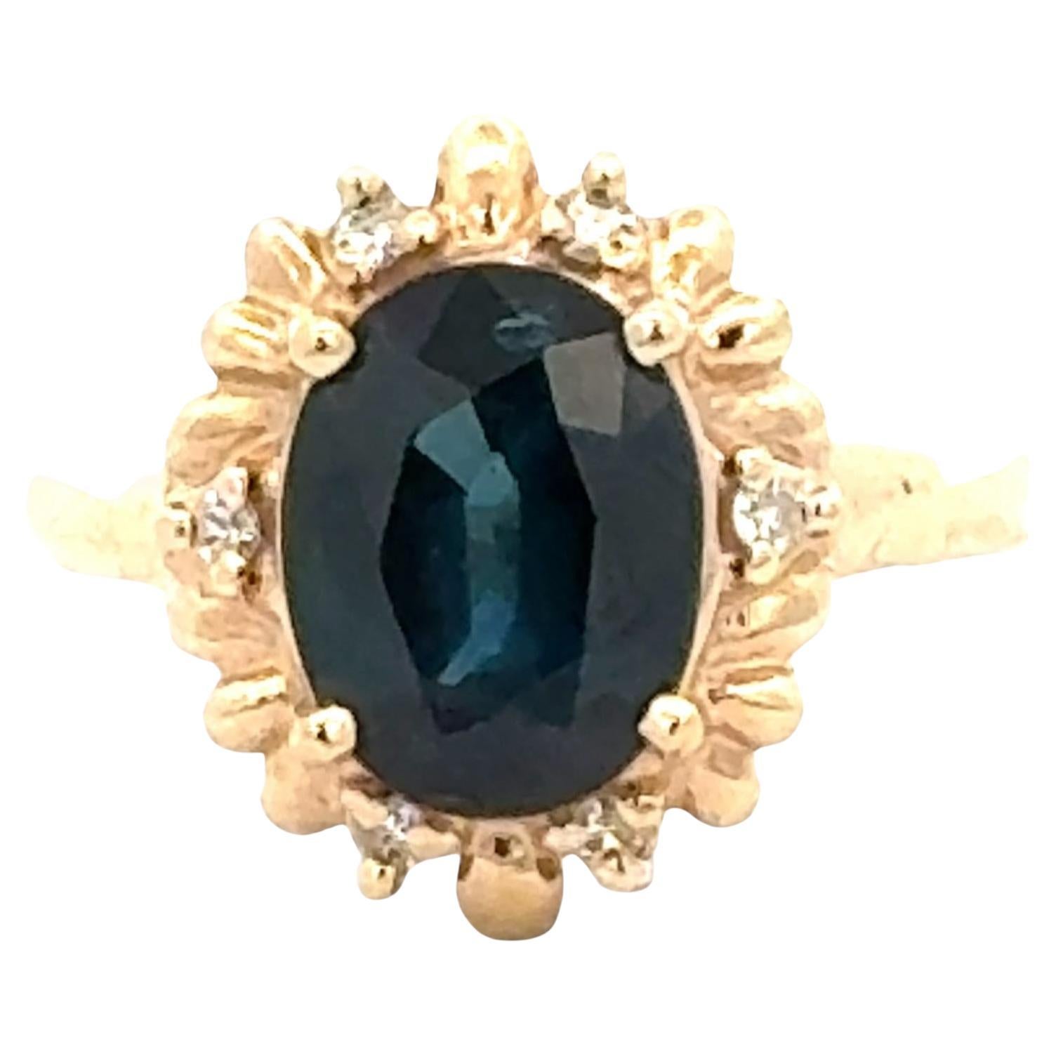 Oval Natural Blue Sapphire Diamond 14 Karat Yellow Gold Cocktail Ring For Sale
