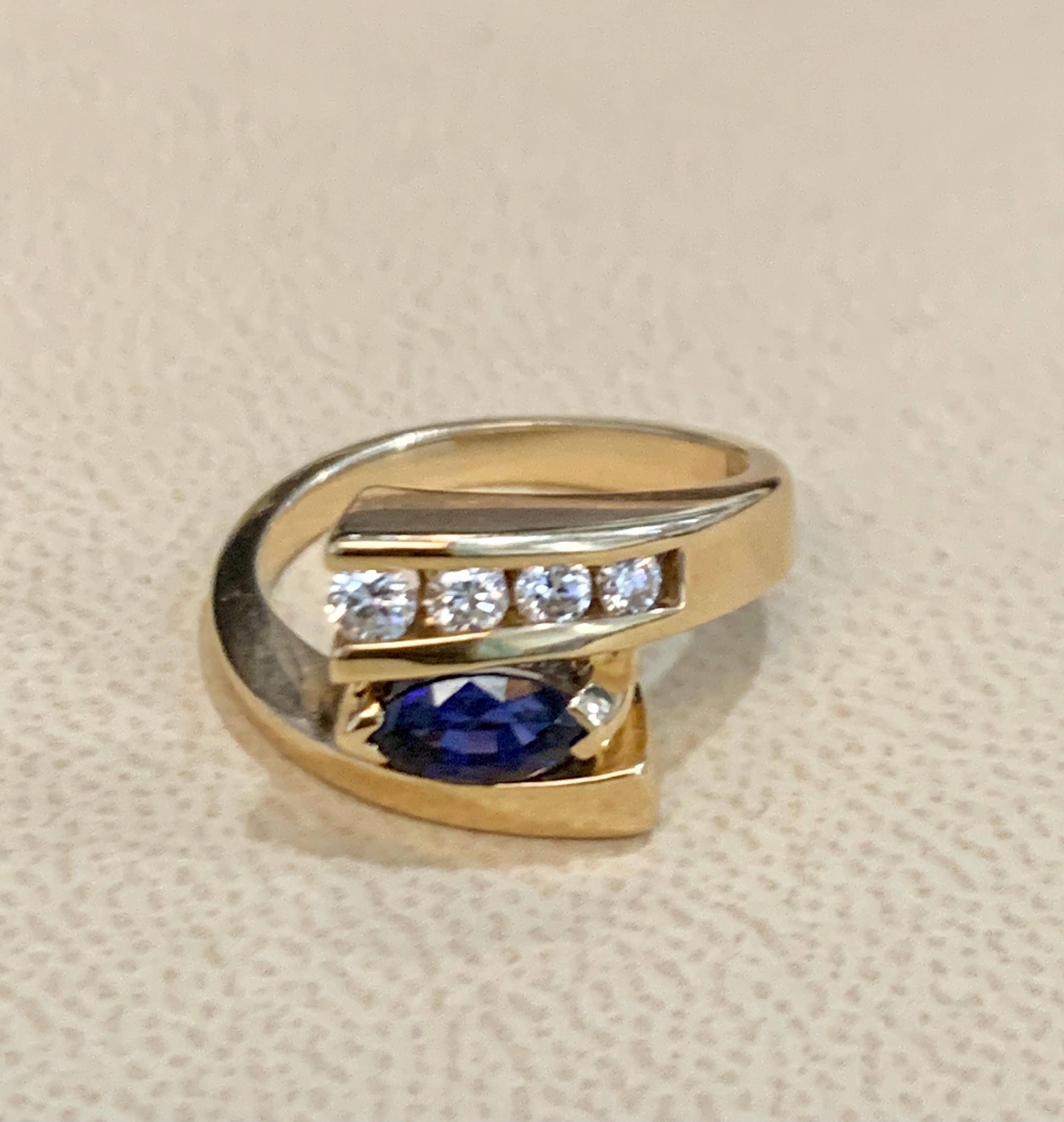 Women's Oval Natural Blue Sapphire and Diamond Engagement Ring in 14 Karat Yellow Gold