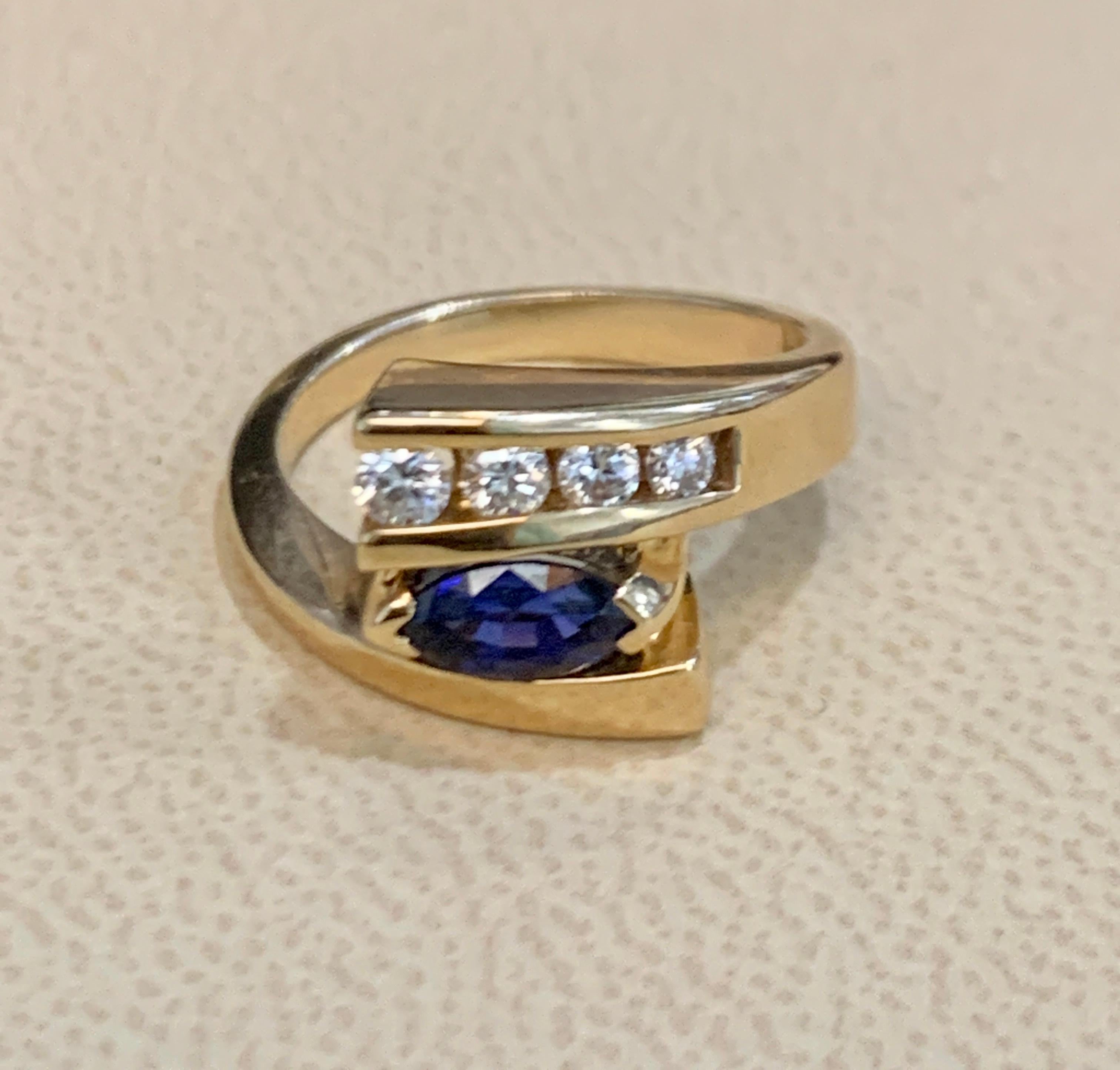 Oval Natural Blue Sapphire and Diamond Engagement Ring in 14 Karat Yellow Gold 1
