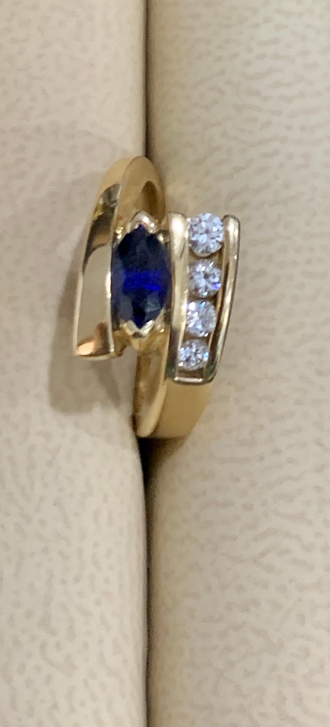 Oval Natural Blue Sapphire and Diamond Engagement Ring in 14 Karat Yellow Gold 2