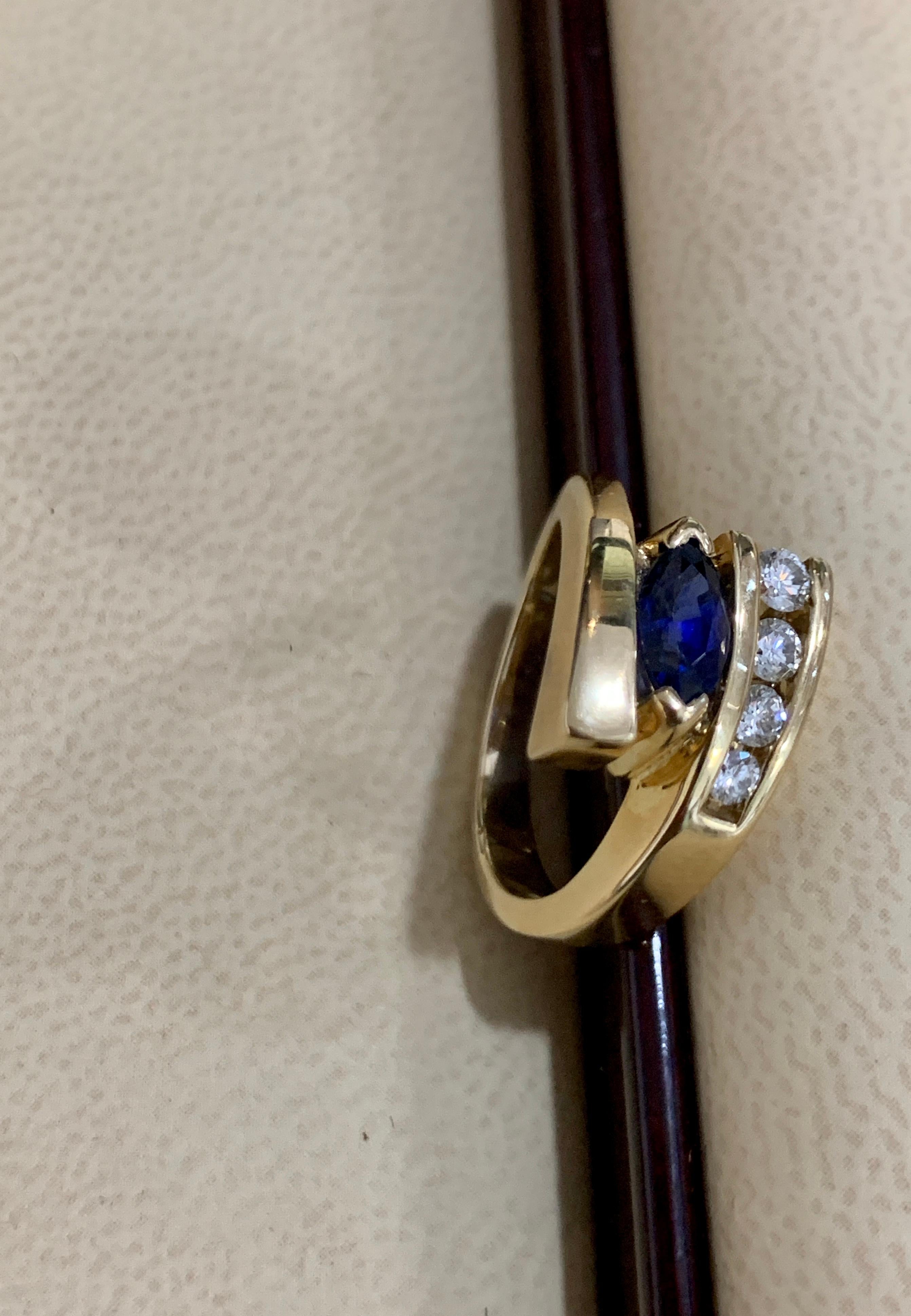 Oval Natural Blue Sapphire and Diamond Engagement Ring in 14 Karat Yellow Gold 4