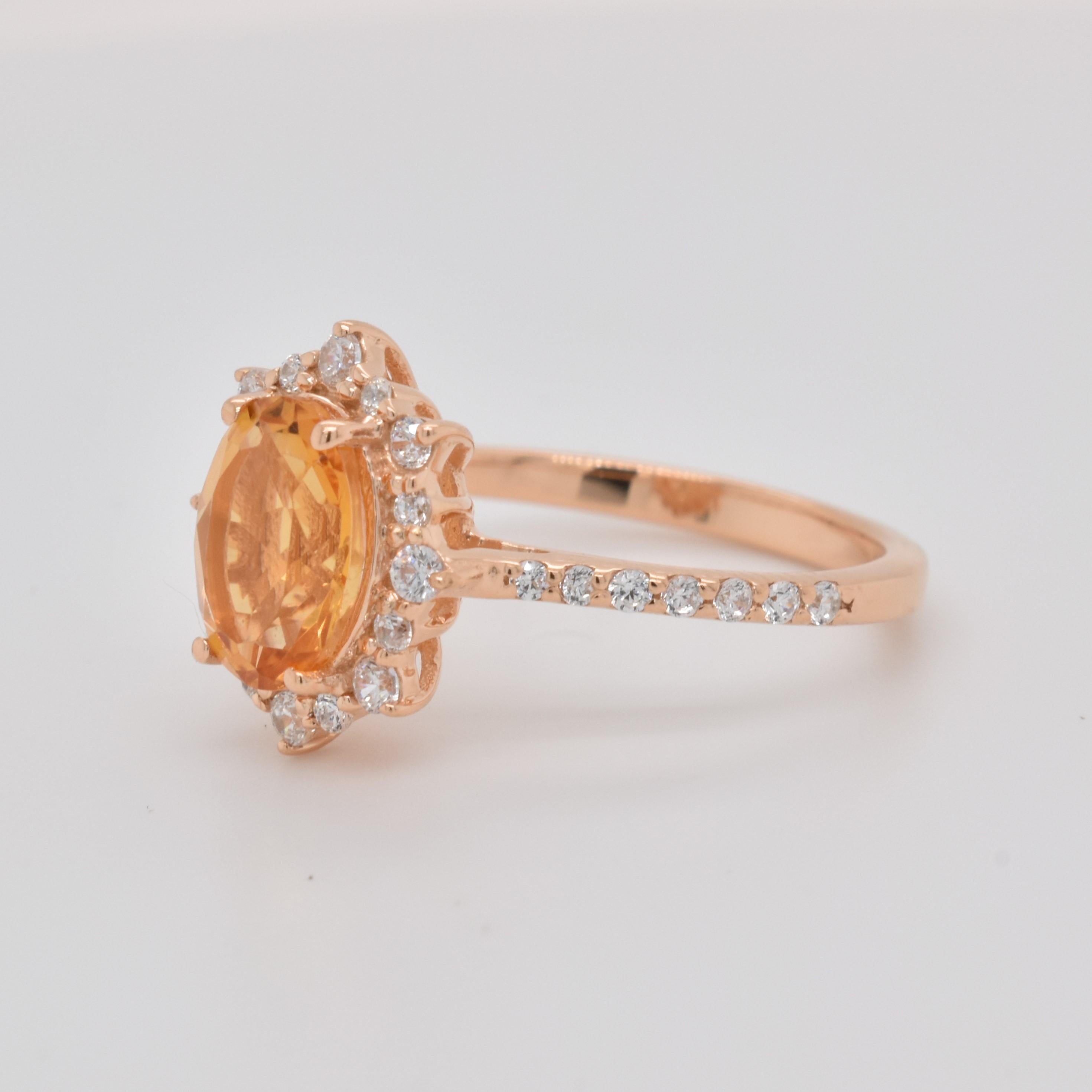 Rose gold plated solid silver natural oval citrine gemstone ring beautifully crafted in a halo design with CZ to finish its look. A November Birthstone Ring. Engagement and propose Ring!!