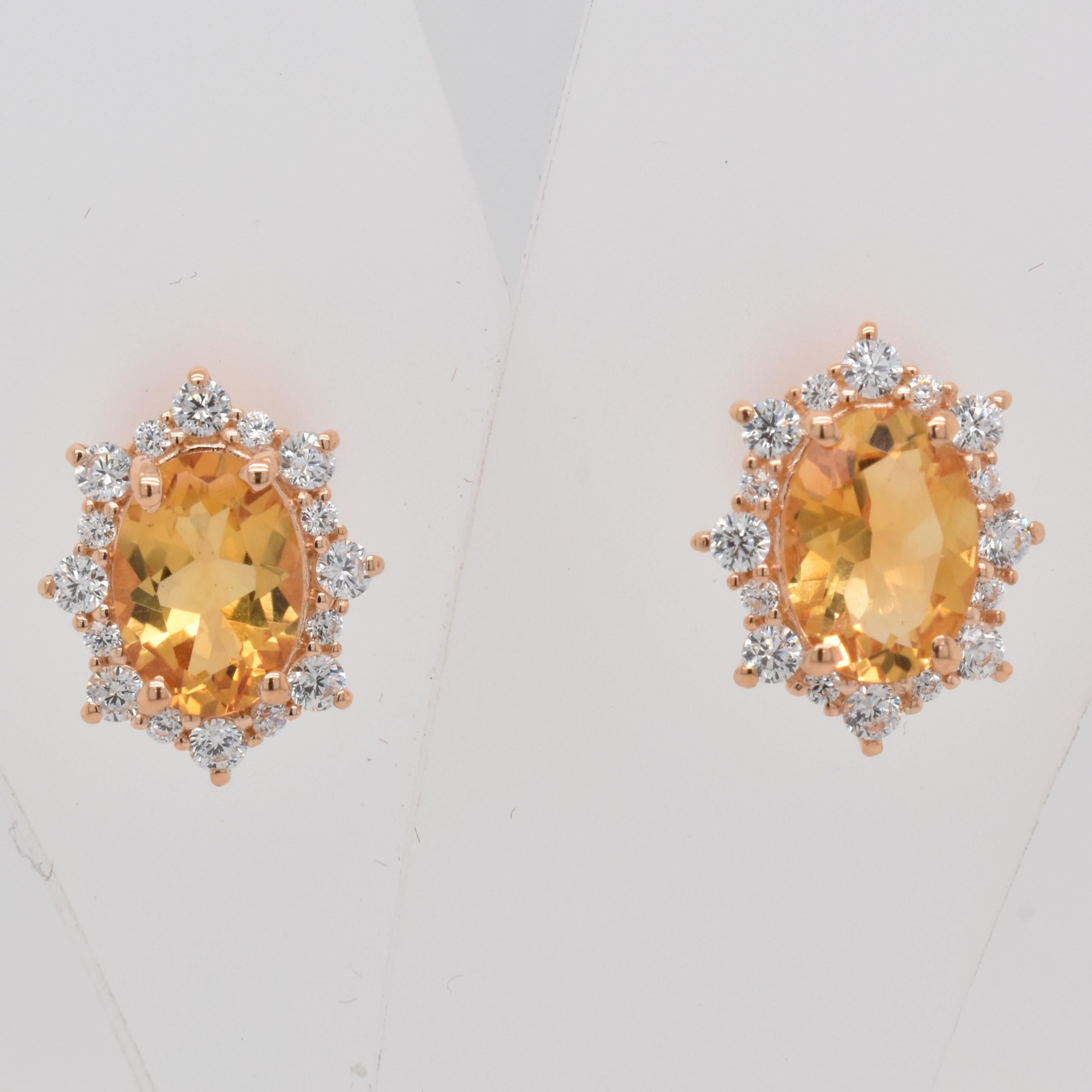 Oval Shape Citrine Gemstone And CZ beautifully crafted  in a Earrings. A fiery Yellow Color November Birthstone. For a special occasion like Engagement or Proposal or may be as a gift for a special person.

Primary Stone Size - 7x5mm