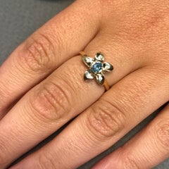 Oval Natural Color Changing Alexandrite and Diamond Flower Ring