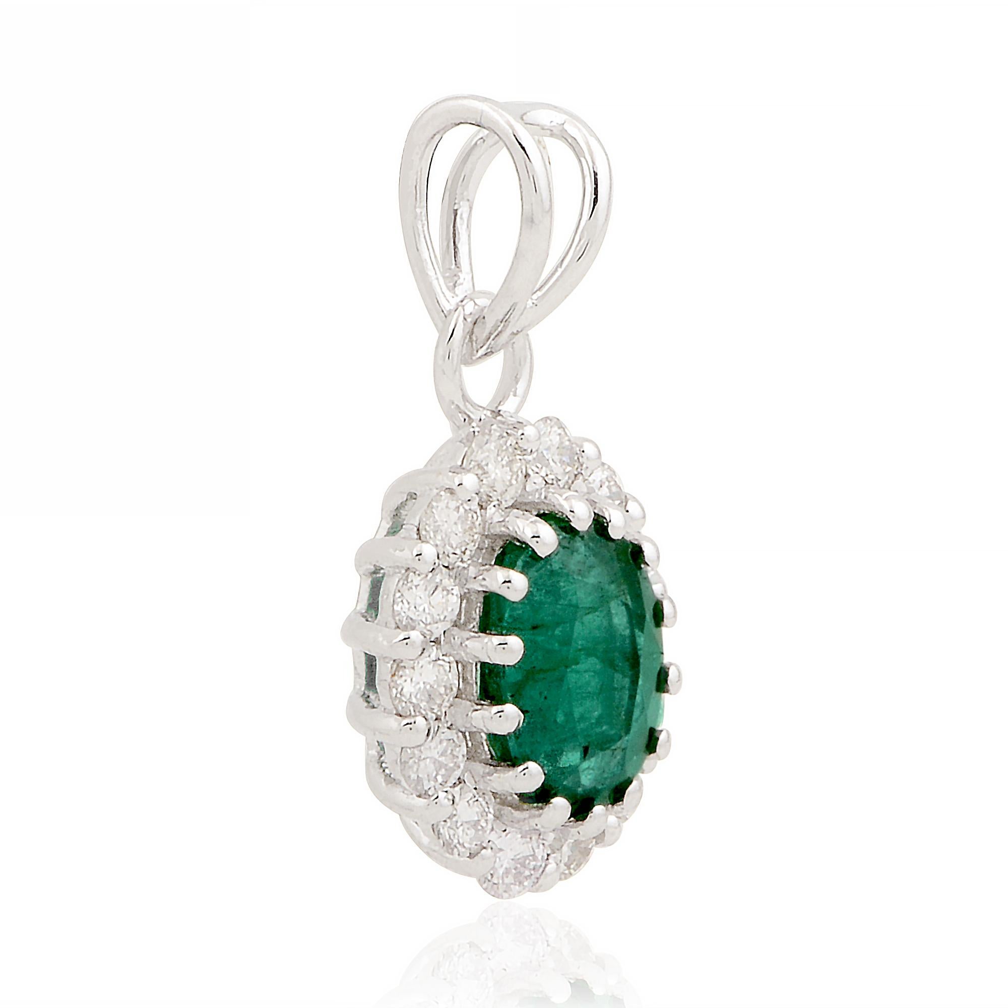 Elevate your jewelry collection with the enchanting beauty of this Oval Natural Emerald Charm Pendant. Crafted in 14k white gold, this exquisite piece showcases a captivating oval-shaped emerald and a sparkling pave diamond charm pendant.

Item Code