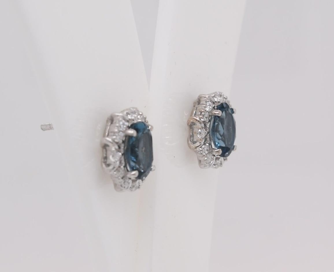 Oval  Natural London Blue Topaz And CZ Rhodium Over Sterling Silver Earrings In New Condition For Sale In Fort Lee, NJ