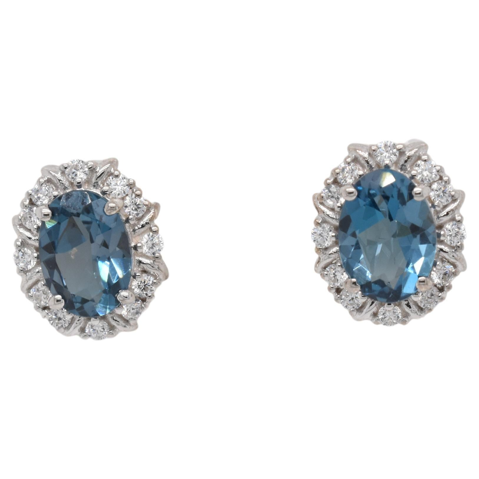 Oval  Natural London Blue Topaz And CZ Rhodium Over Sterling Silver Earrings For Sale