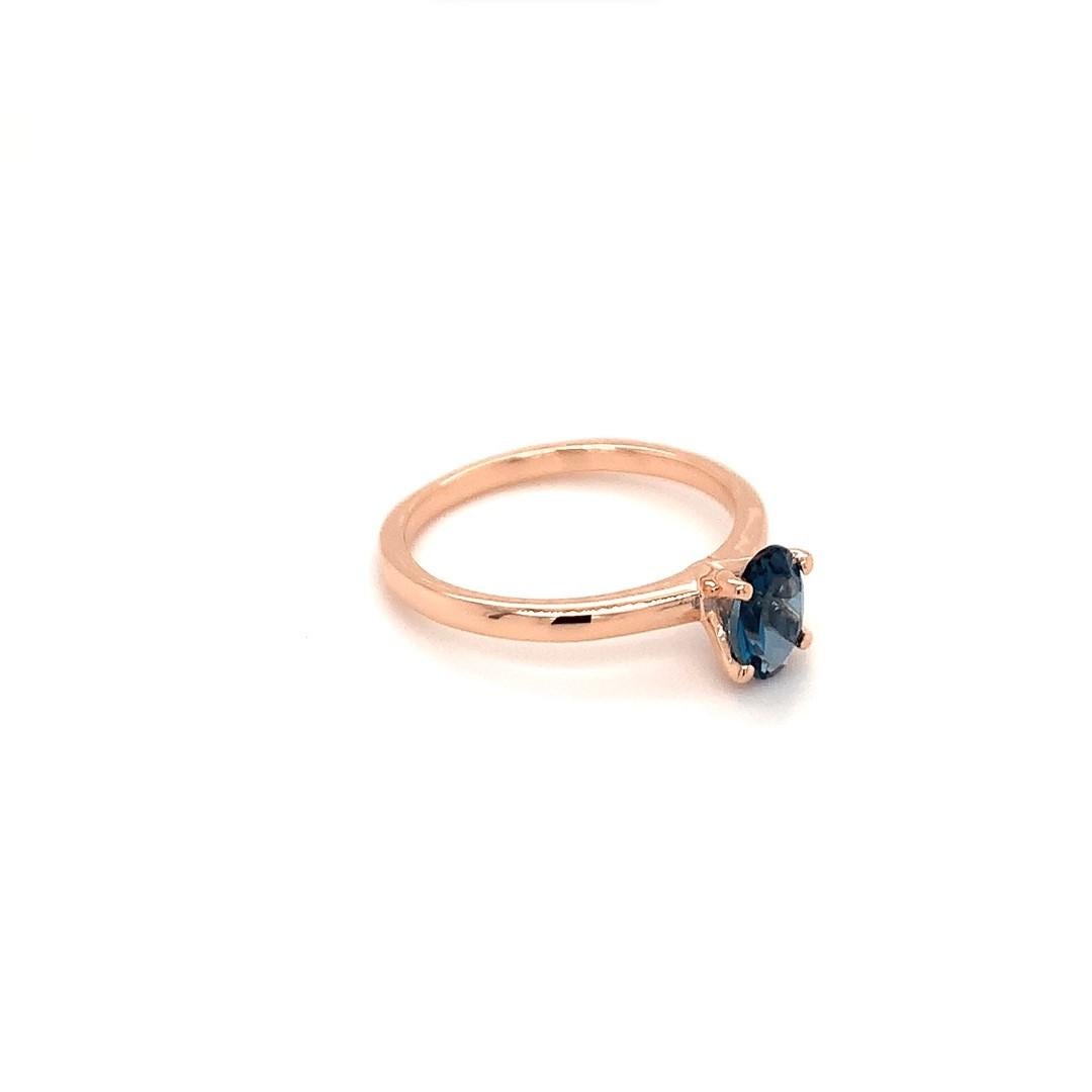 Oval Cut Oval Natural London Blue Topaz Rose Gold Over Sterling Silver Ring For Sale