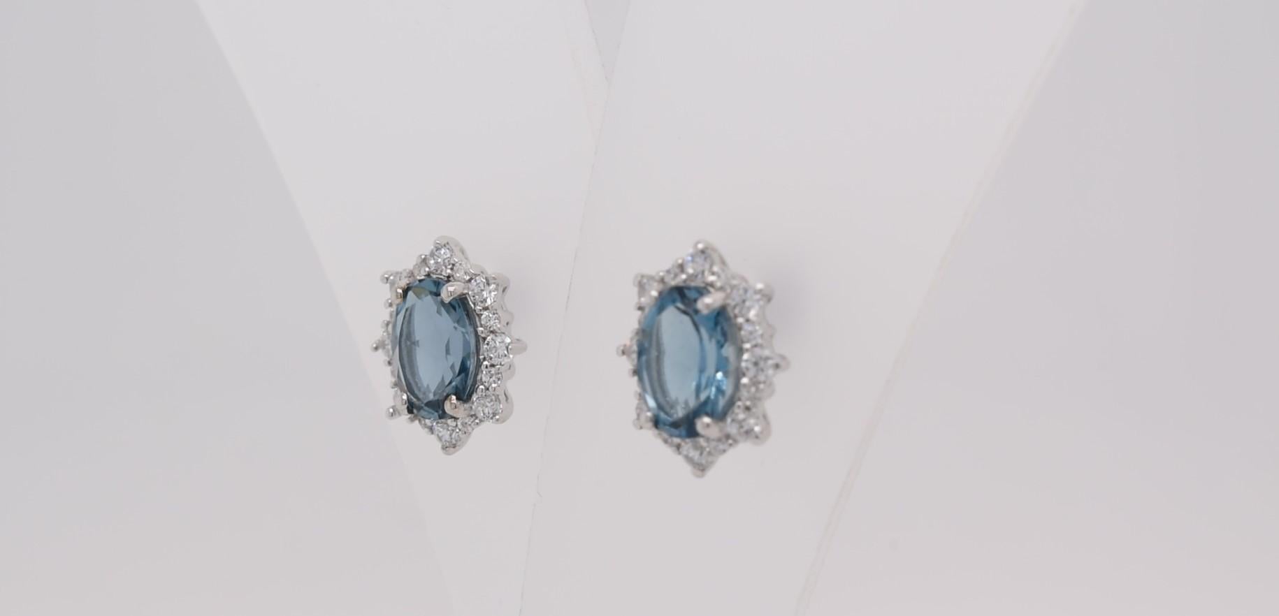 Oval Natural London Blue Topaz And CZ Rhodium over Sterling Silver Earrings In New Condition For Sale In Fort Lee, NJ