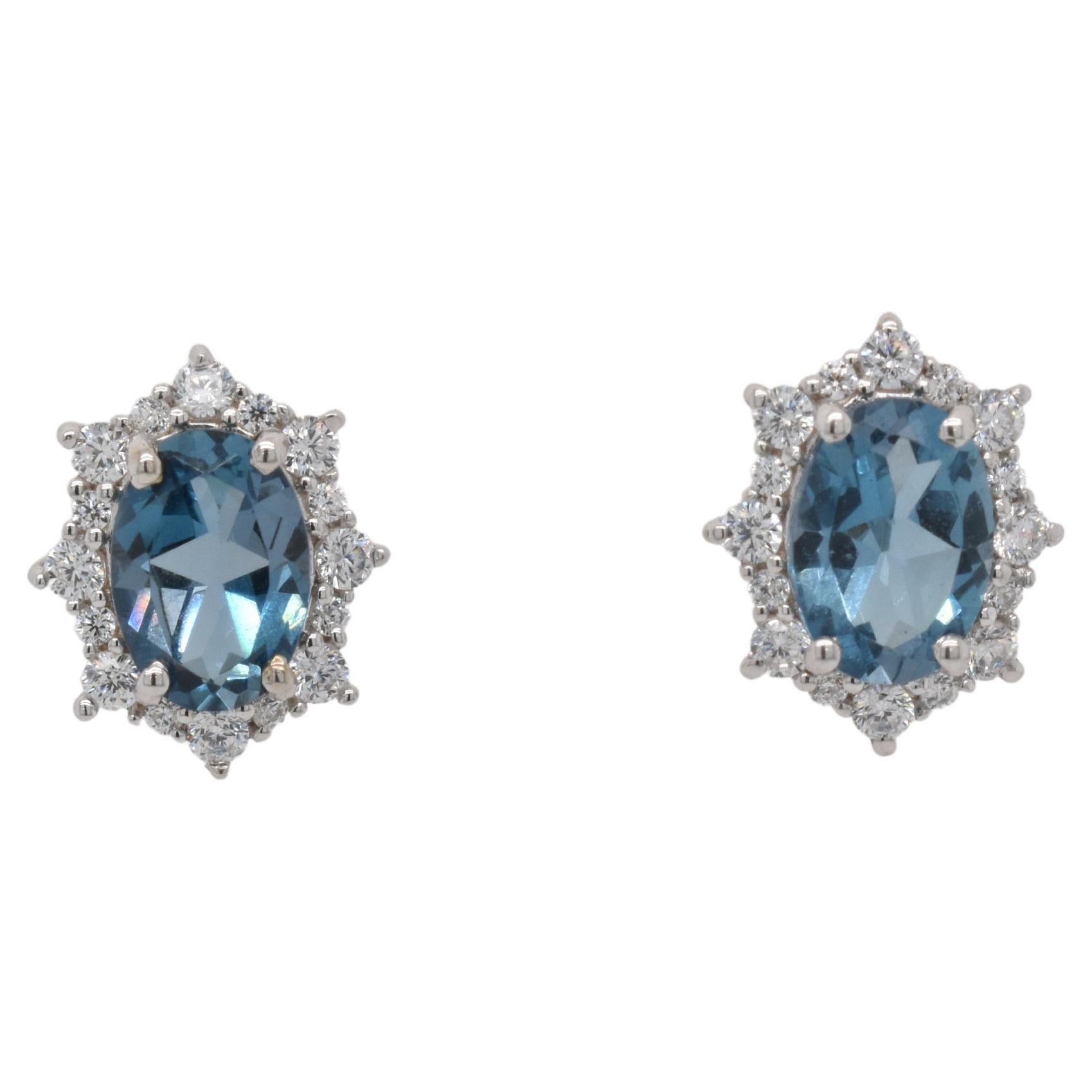 Oval Natural London Blue Topaz And CZ Rhodium over Sterling Silver Earrings For Sale