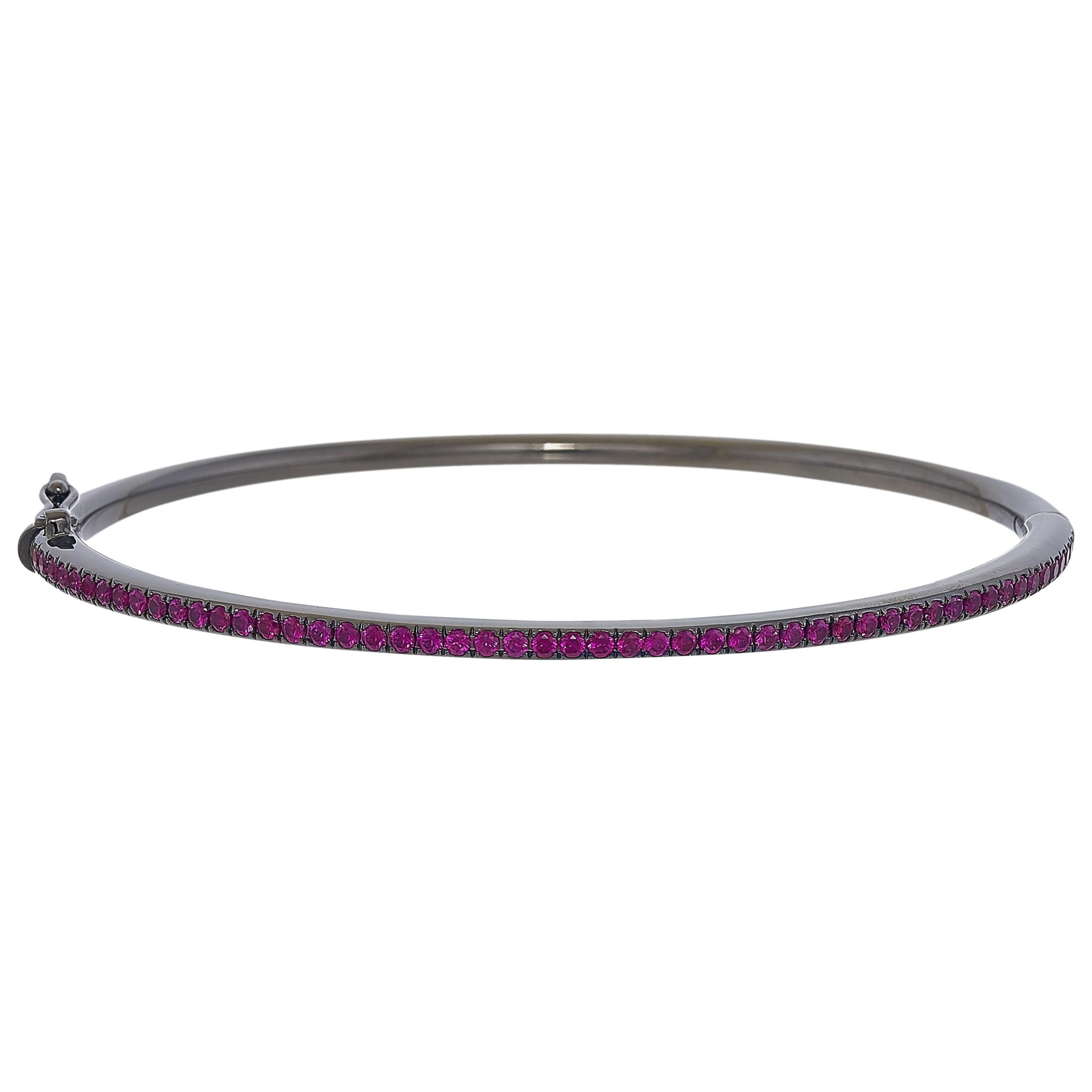 Oval Natural Ruby Bangle in White Gold and High Polish Black Rhodium For Sale