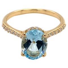 Natural Sky Blue Topaz with CZ, Yellow Gold plating over Sterling Silver Ring