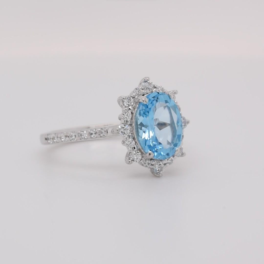 Oval Natural Swiss Blue Topaz with CZ, Rhodium Over Sterling Silver Ring In New Condition For Sale In Fort Lee, NJ