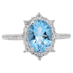 Oval Natural Swiss Blue Topaz with CZ, Rhodium Over Sterling Silver Ring