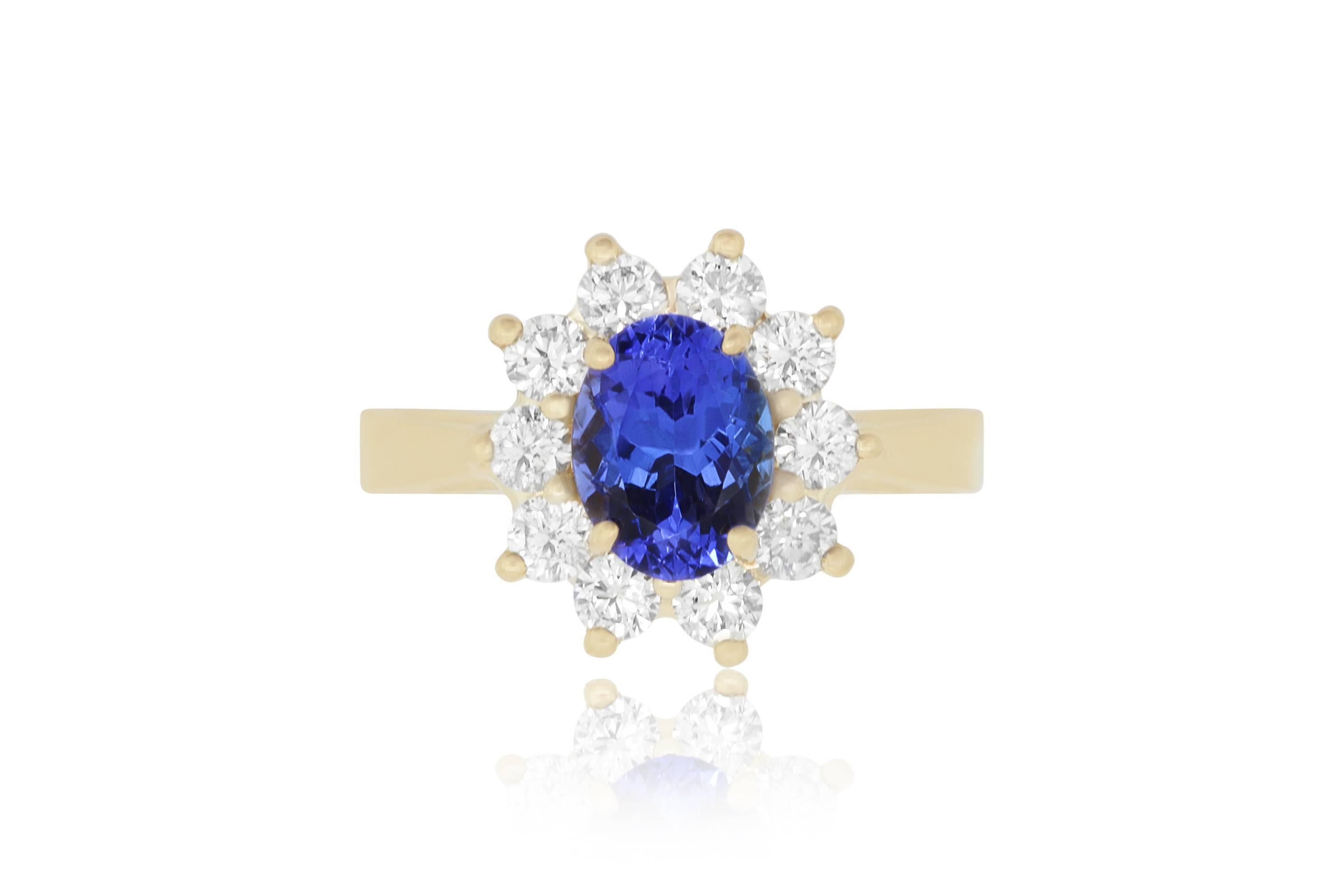 This ring is perfect for the colored jewelry lover. A stunning 1.43 Carat Oval shaped Tanzanite is framed by a snowflake made up of 0.73 Carats of White diamonds. A beautiful blend of classic and chic.

Material: 14k Yellow Gold
Gemstones: 1 Oval