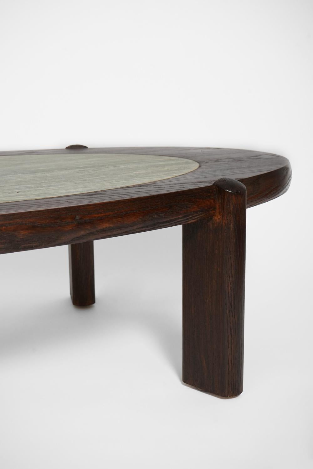 French Oval oak and granite coffee table, 1960s. For Sale