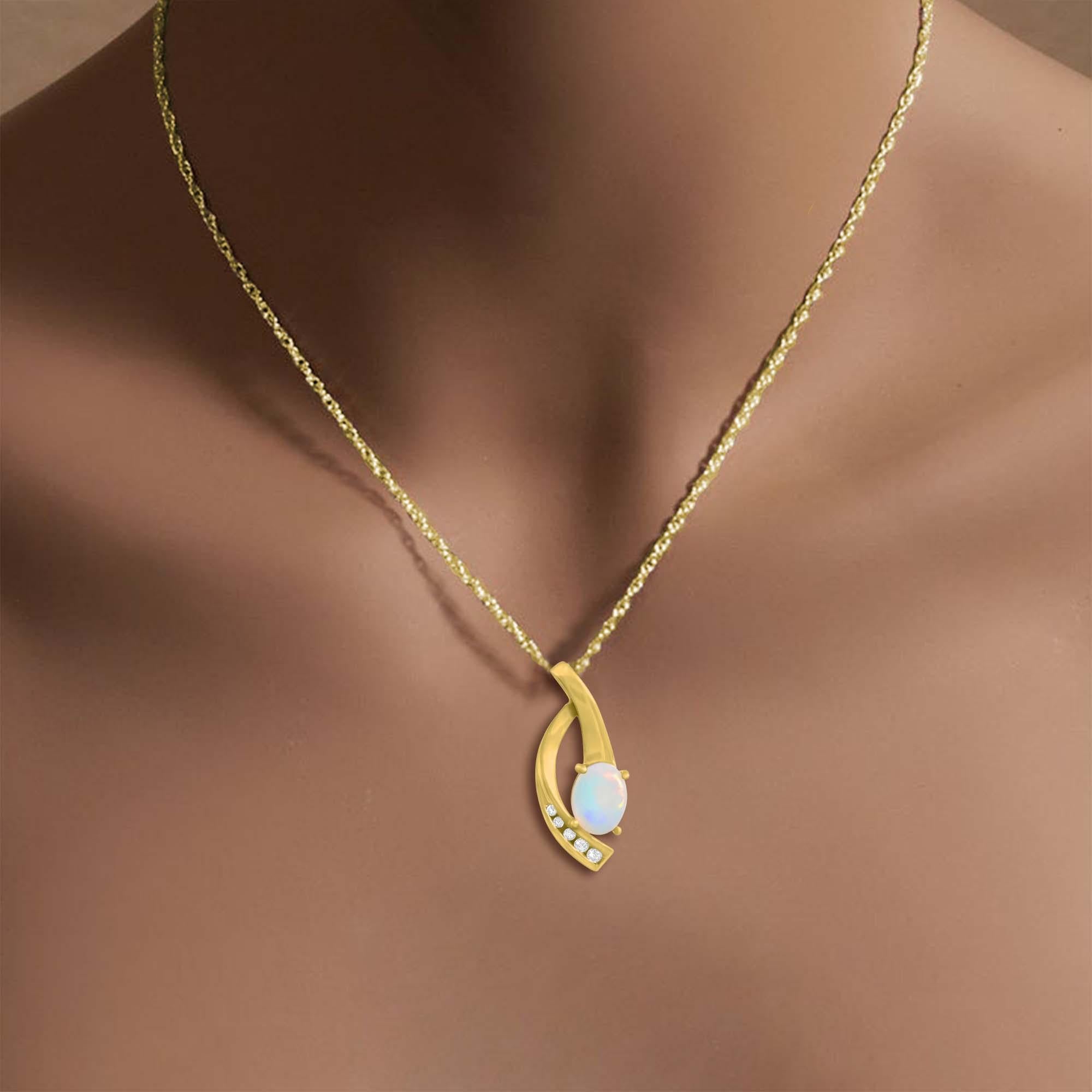 ♥ Product Summary ♥

Main Stone: Australian Opal & Diamond
Approx. Diamond Carat Weight: .16ct
Material: 14K Yellow Gold
Opal Size: 9mm
Dimensions: 27mm x 12mm
Chain: 18