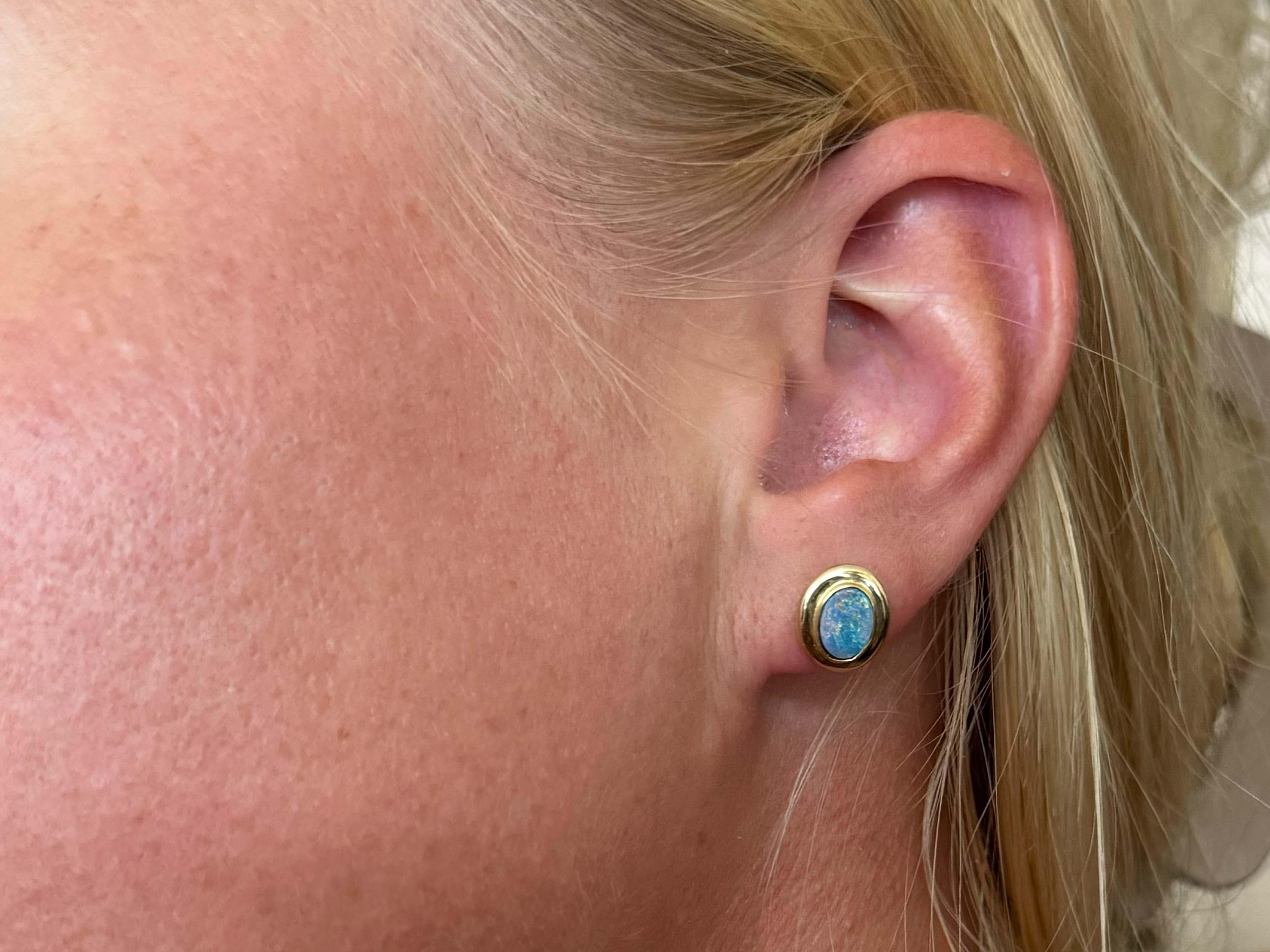 Earrings Specifications:

Metal: 14k Yellow Gold

Total Weight: 1.6 Grams

​Earring Diameter: 10.7 mm x 9.4 mm
​
​Opal Diameter: 7.2mm x 5.7 mm

Gemstone: Opal Dublets

Stamped: 