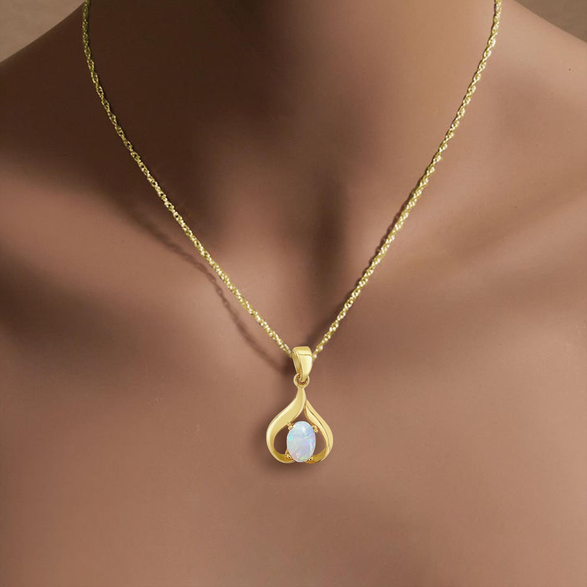 ♥ Sommaire du produit ♥

Pierre principale : Opale 
MATERIAL : Or jaune 14K 
Taille de la pierre : Ovale
Dimensions : 20MMX 12MM
Poids : 1 gramme
Chaîne : 16