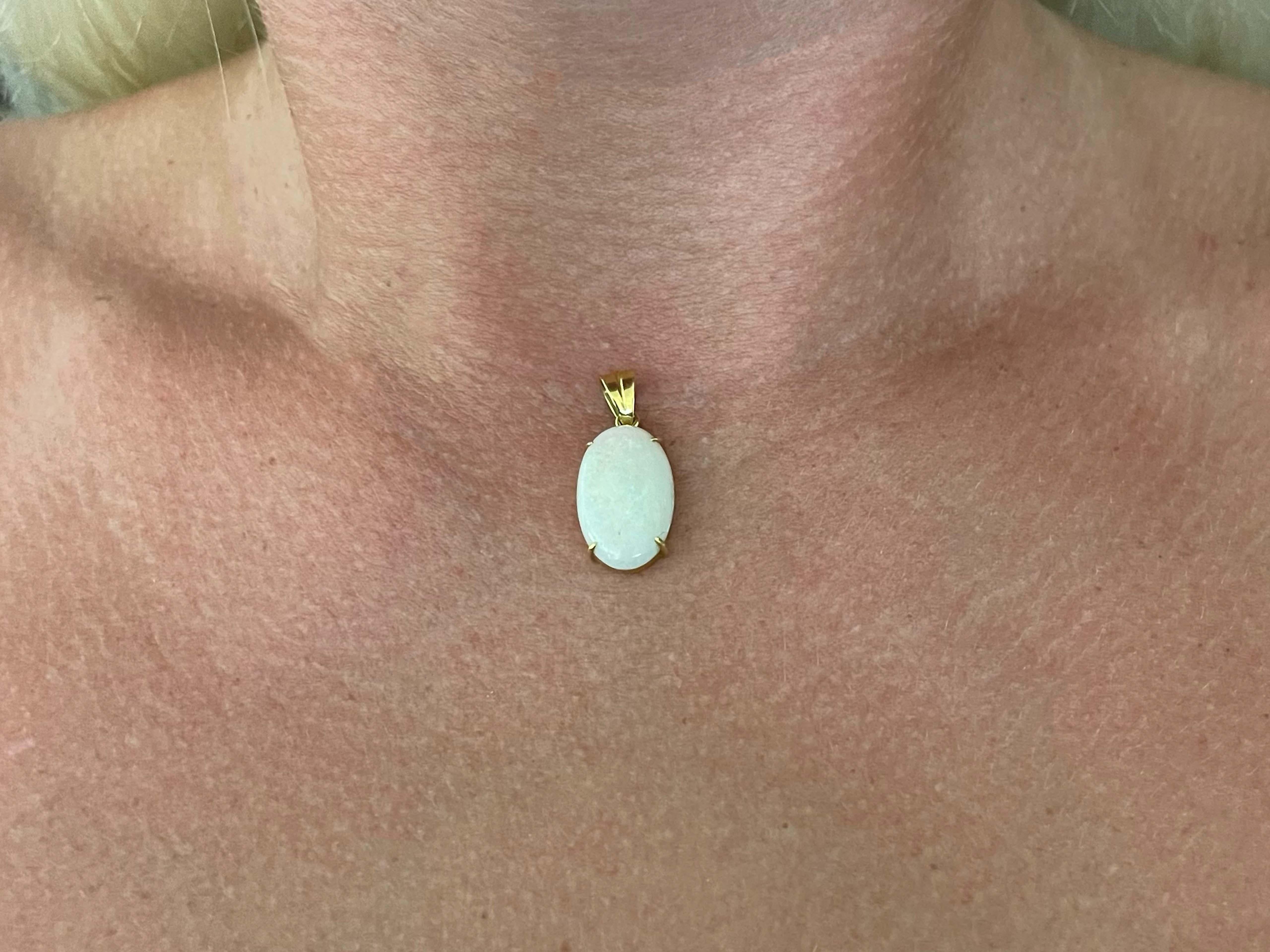 Item Specifications:

Metal: 18K Yellow Gold

Style: Opal Pendant

Total Weight: 2.3 Grams

Gemstone Specifications:

Center Gemstone: Opal

Gemstone Measurements: 19.2 mm x 11.7 mm x 4 mm
​
​Opal Carat Weight:  ~5 carats

Condition: Excellent