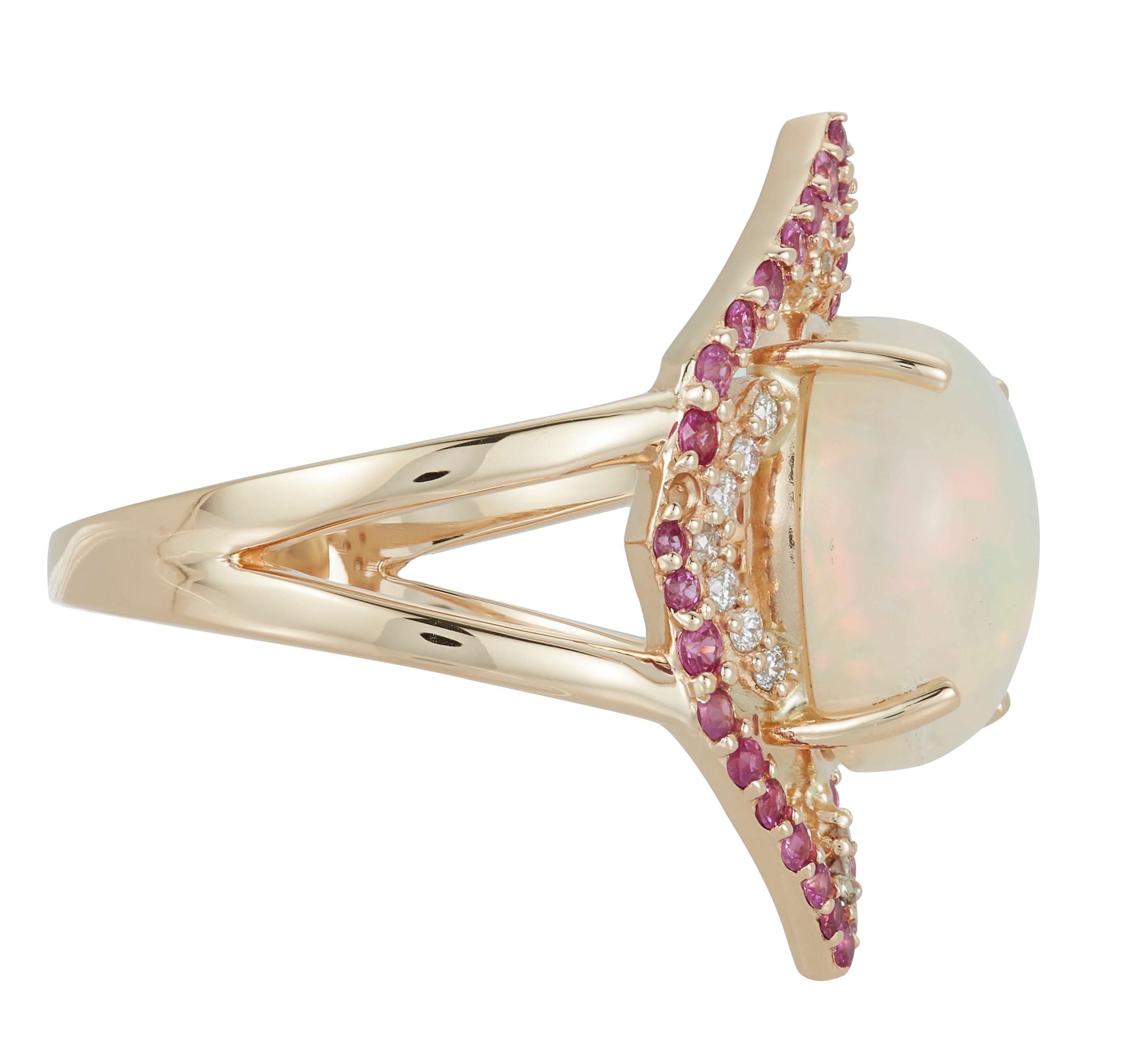 14K Yellow Gold
1 Oval Opal at 2.73 Carats- Measuring 11 x 9 mm
36 Round Pink Sapphires at 0.40 Carats
20 Round White Diamonds at 0.12 Carats - Color: H-I /Clarity: SI

Alberto offers complimentary sizing on all rings. 

Fine one-of-a-kind