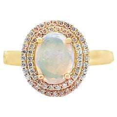 Oval Opal Ring in 14K Yellow Gold with Double Halo Diamond