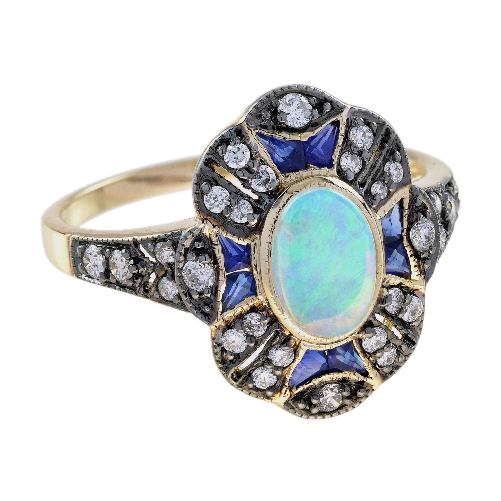Entra in un mondo di eleganza vintage con il nostro elegante anello in stile art déco in oro giallo con opale, zaffiro blu e diamante. Al centro di questo splendido pezzo si trova un affascinante opale ovale, noto per il suo gioco di colori
