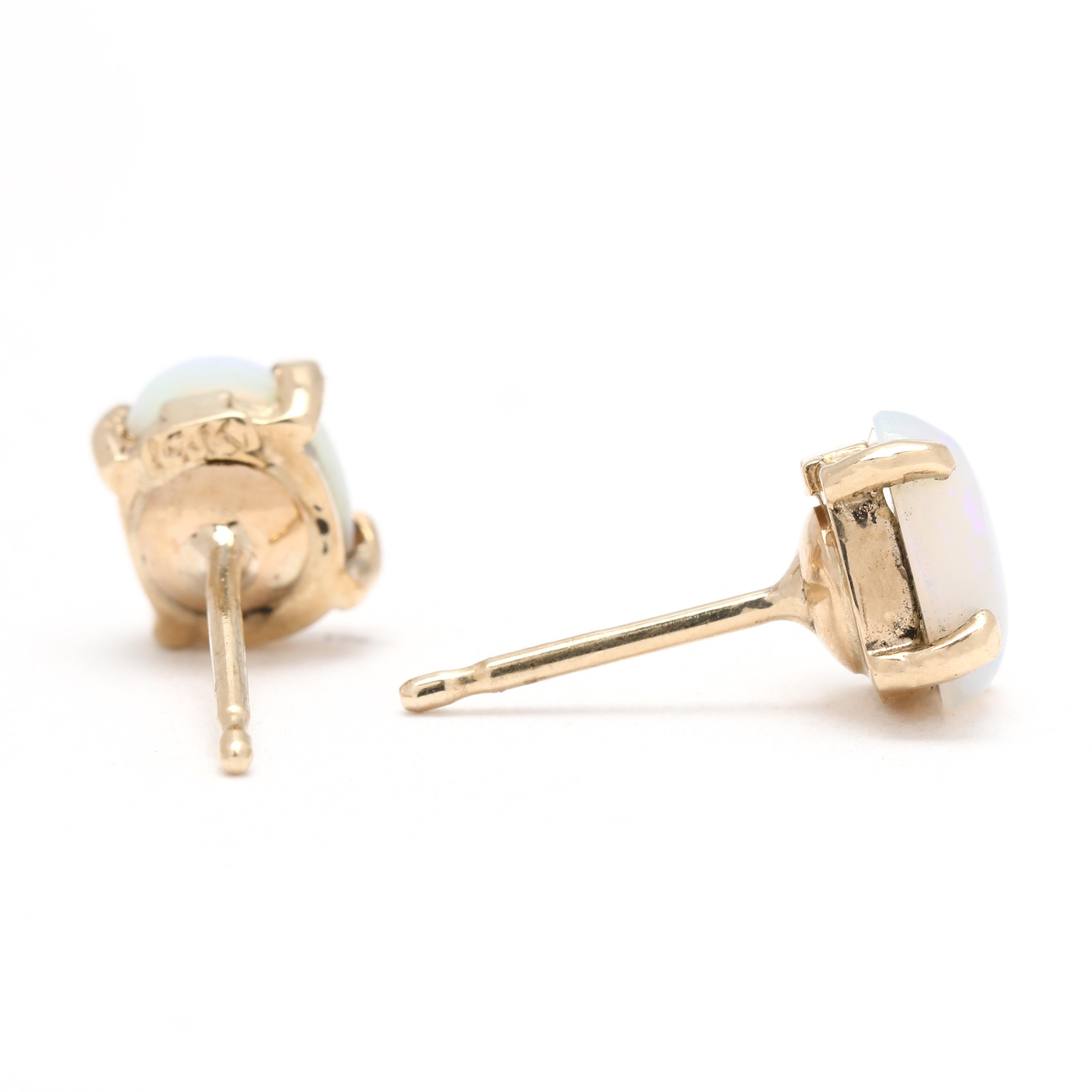 Stones:
opal, 2 stones
oval cab
7.2 x 5.2 mm

Length: 7 mm

Width: 5 mm

Weight: .8 dwts / 1.2 grams

Stamps: 
