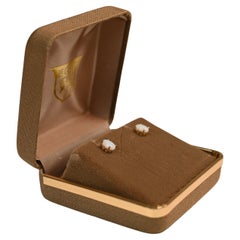 Orecchini ovali con opale (circa 0,70 carati) in oro giallo 14 carati