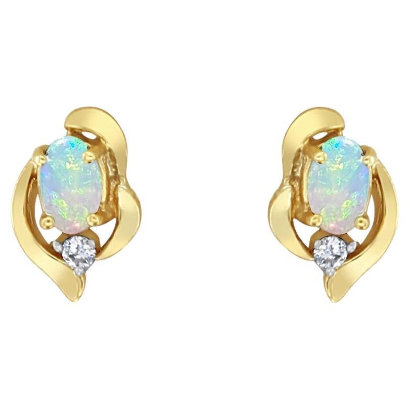 Borchie ovali in opale con accenti di diamanti