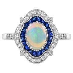 Oval Opal with Sapphire Diamond Art Deco Style Halo Ring in 14K White Gold