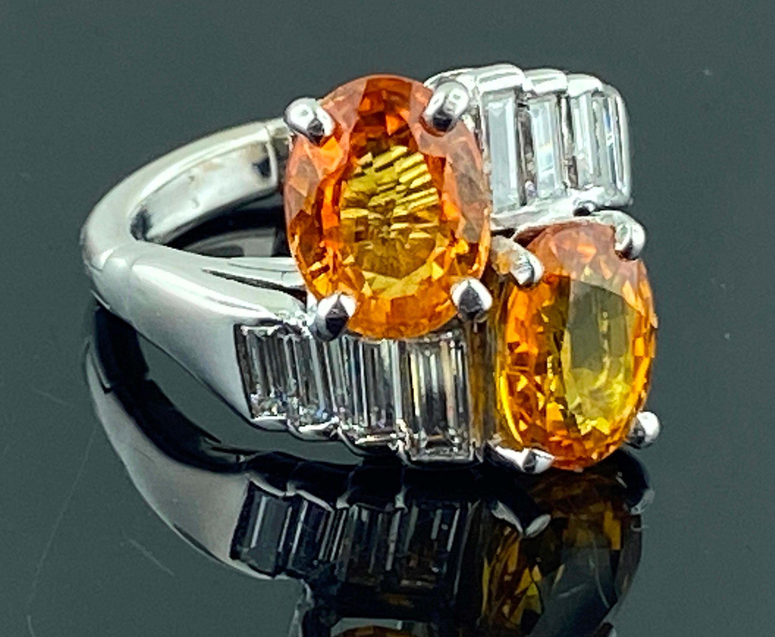 Women's or Men's Oval Orange Sapphire and Diamond Crossover Ring For Sale