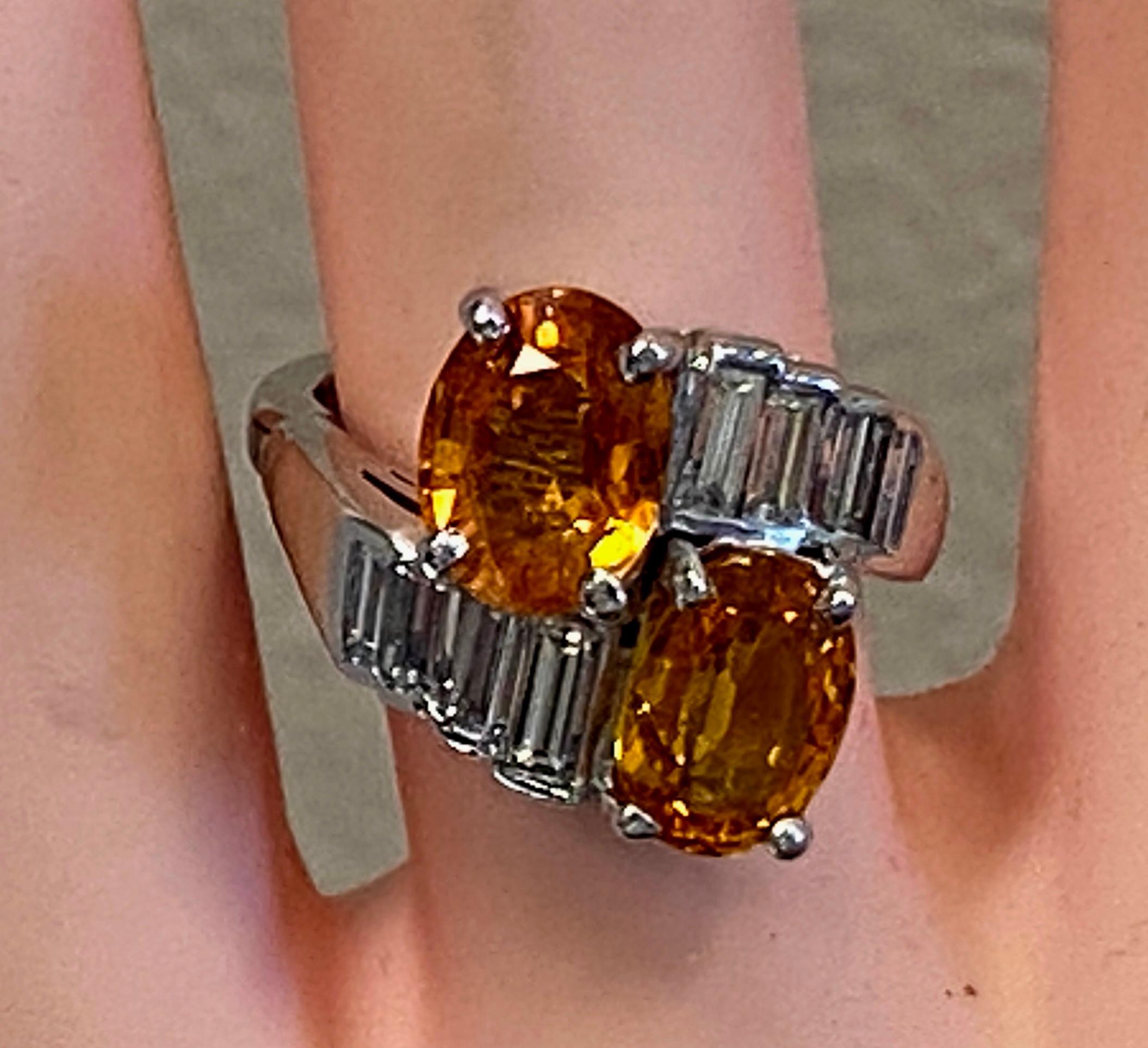 Oval Orange Sapphire and Diamond Crossover Ring For Sale 1
