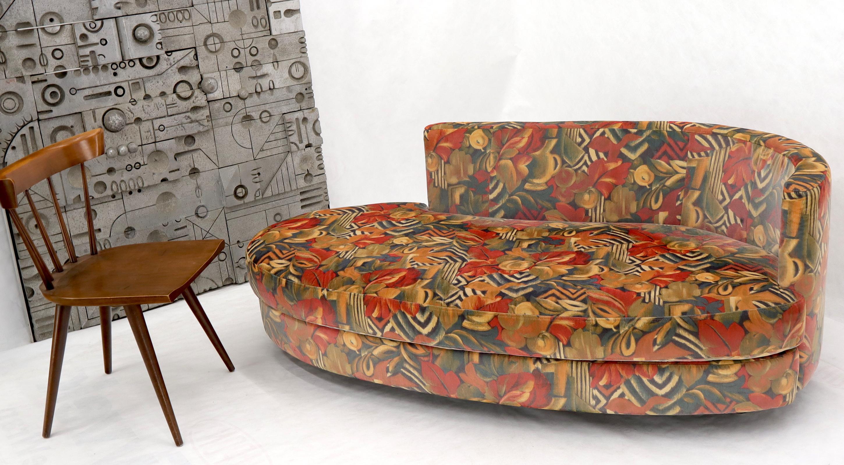 Contemporary modern organic curvy shape daybed sofa chaise lounge in colorful modern upholstery fabric.