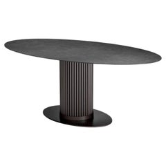 Oval Outdoor Dining Table with Bronze Finish and Grey Ceramic Top