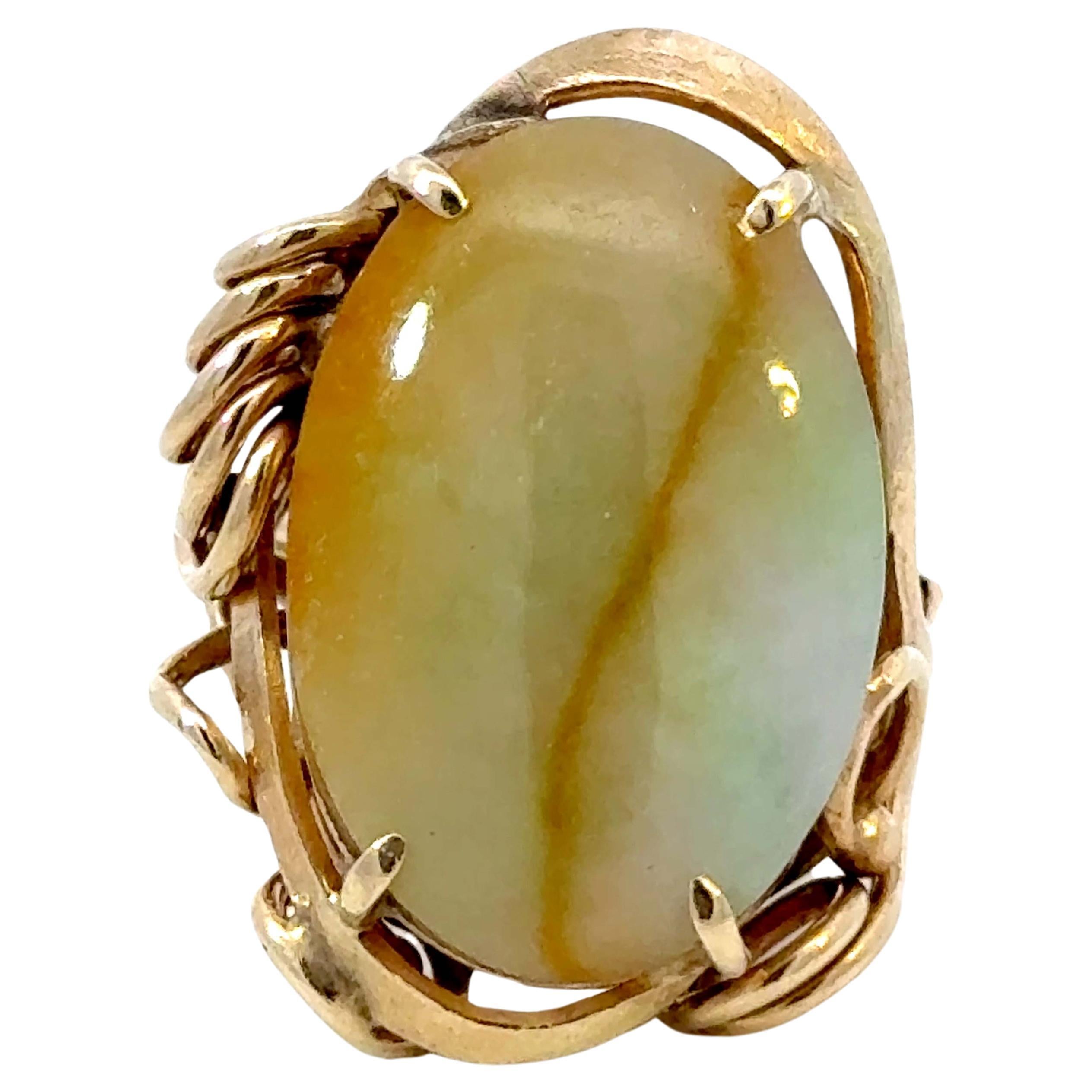 Oval Pale Green and Brown Jade Ring 14k Yellow Gold For Sale