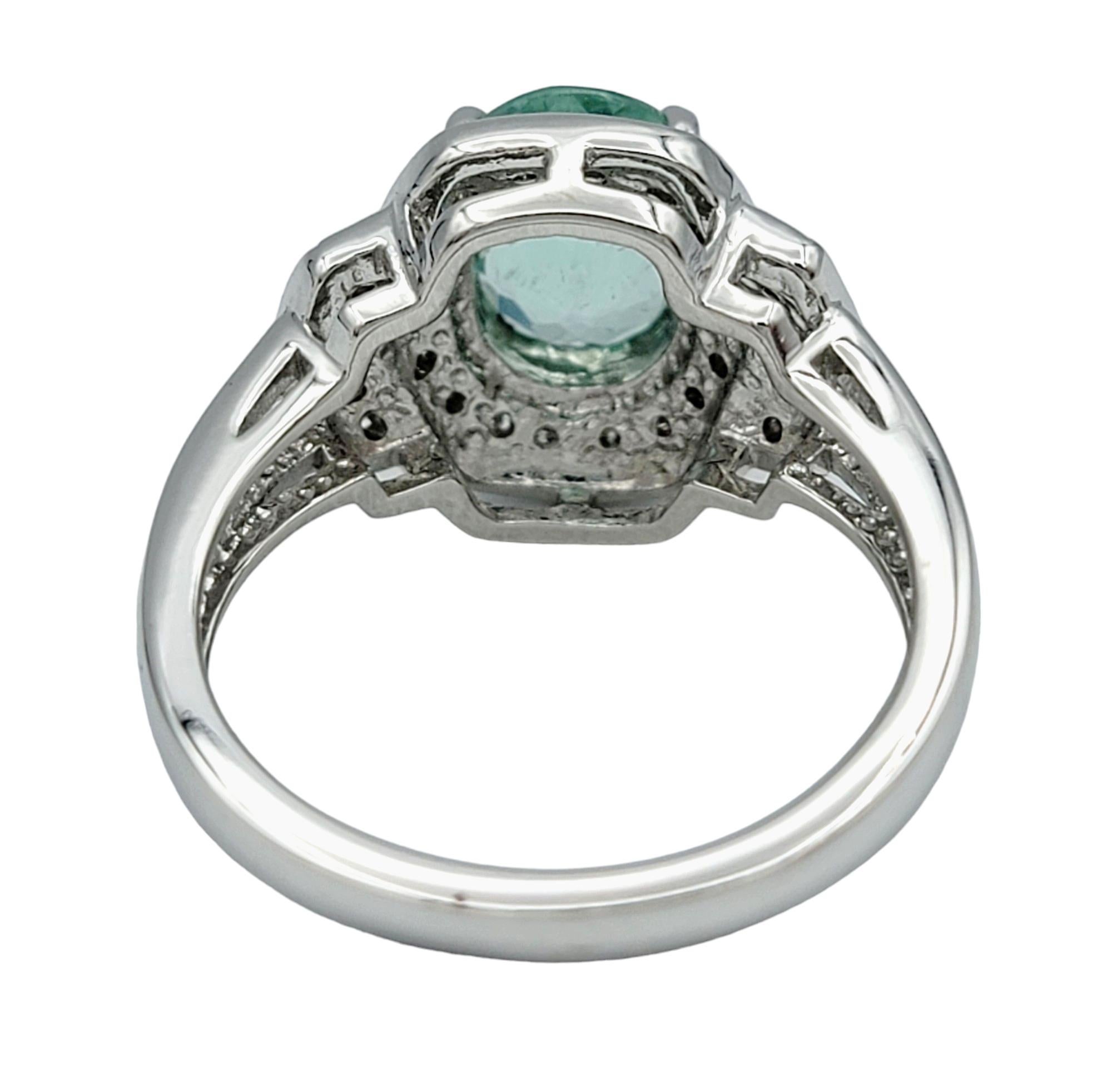 Oval Paraiba Tourmaline Ring with Round Diamond Halo Set in 18 Karat White Gold In Good Condition For Sale In Scottsdale, AZ