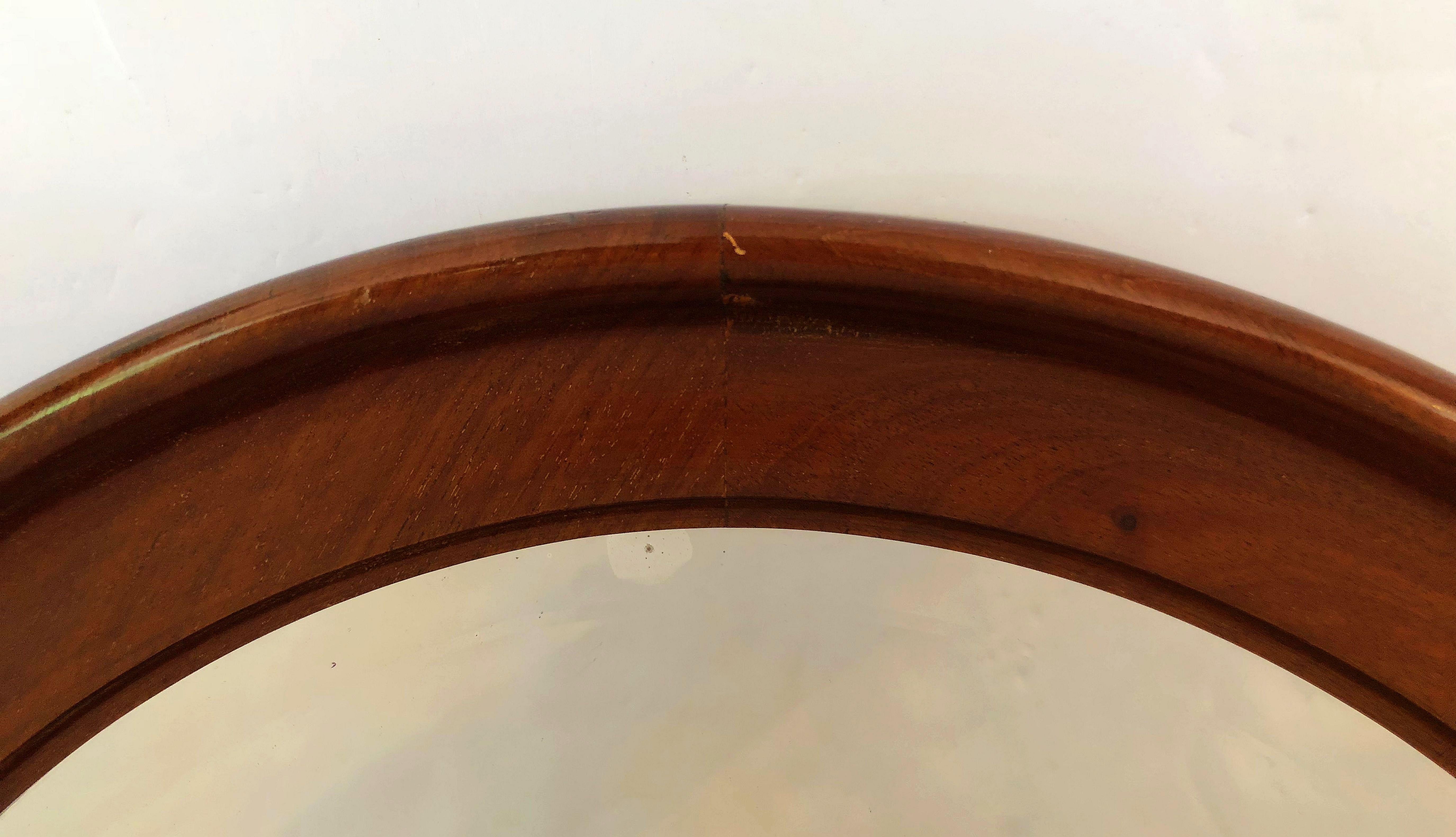oval mahogany mirror
